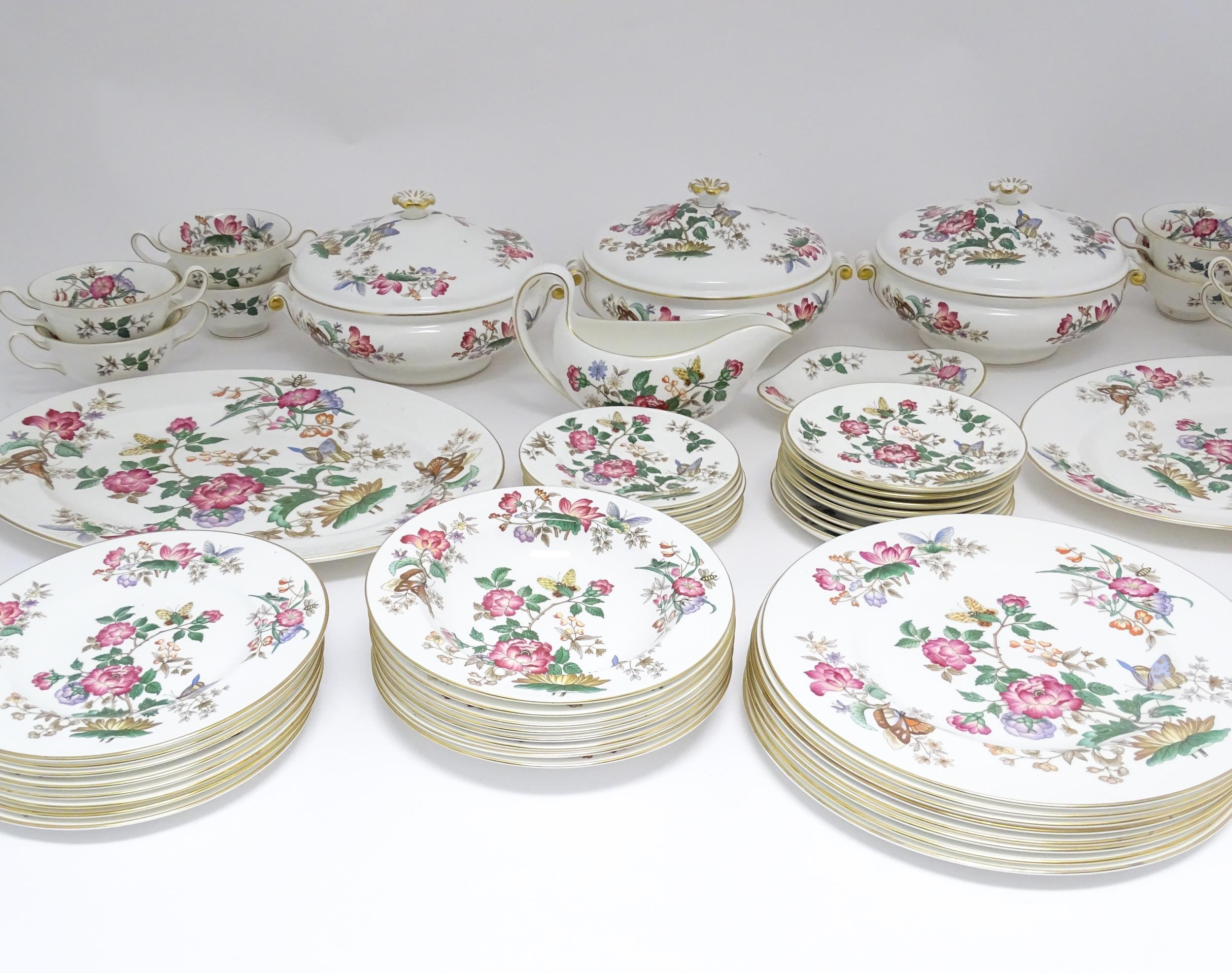 A quantity of Wedgwood dinner wares in the Charnwood pattern to include plates, twin handles soup - Image 9 of 25