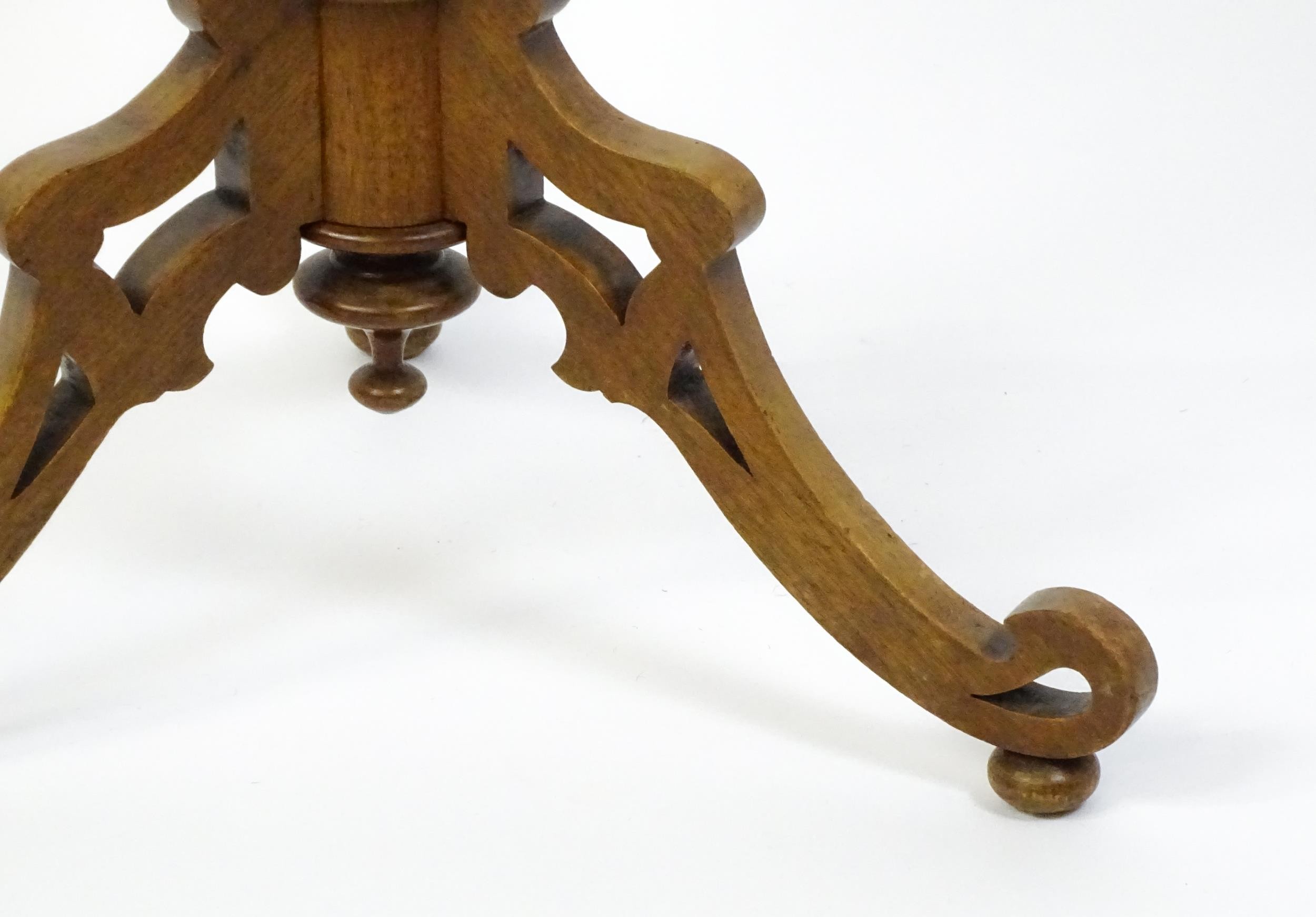 A 19thC tripod table with a burr amboyna veneered top surrounding a central parquetry style sample - Image 10 of 10