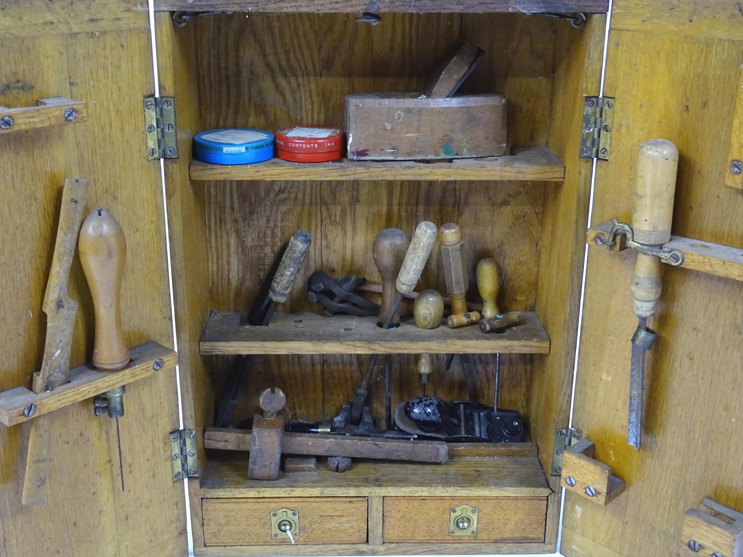 An early / mid 20thC wall hanging work box , containing carpentry / woodworking tools to include - Image 3 of 4