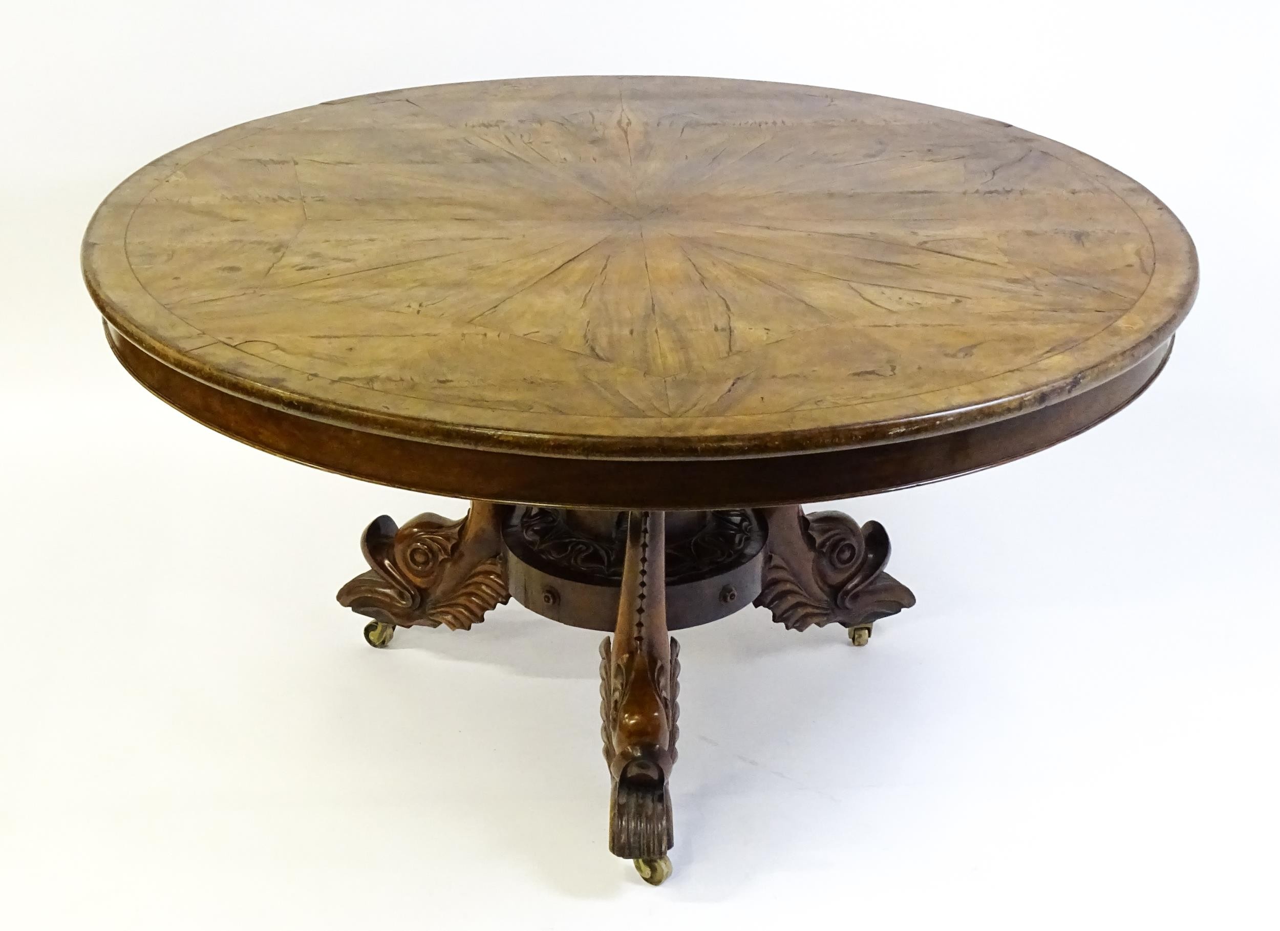 A 19thC dining table with an olive wood veneered circular top raised on a rosewood pedestal with - Image 12 of 15