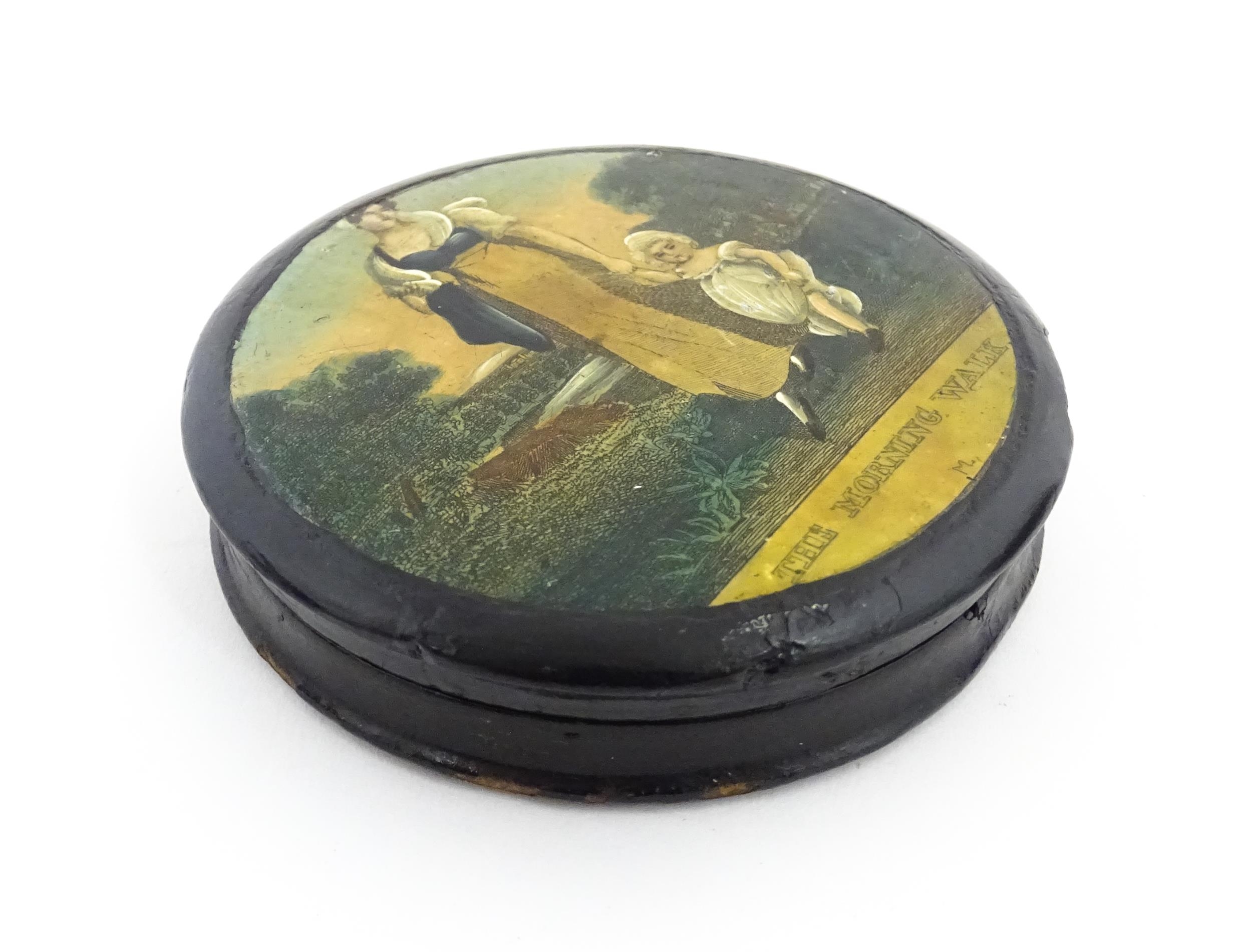 A 19thC papier mache lacquered snuff box of circular form, the lid with applied engraving titled The - Image 7 of 10