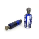 A glass scent / perfume bottle with blue flash cut decoration. Together with a Bristol blue coloured