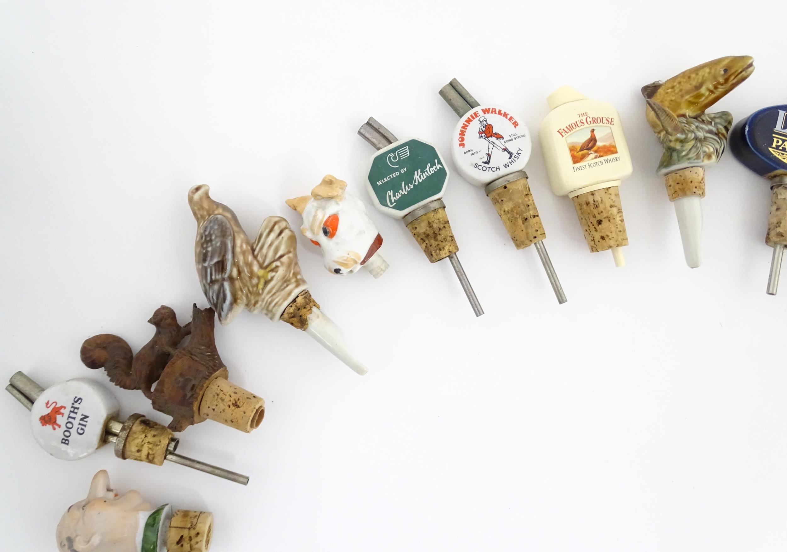 Breweriana : A quantity of assorted 20thC advertising bottle stoppers / pourers to include Booth's - Image 5 of 16