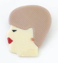 Lea Stein Paris : A brooch formed as a female head. Approx. 2" high Please Note - we do not make