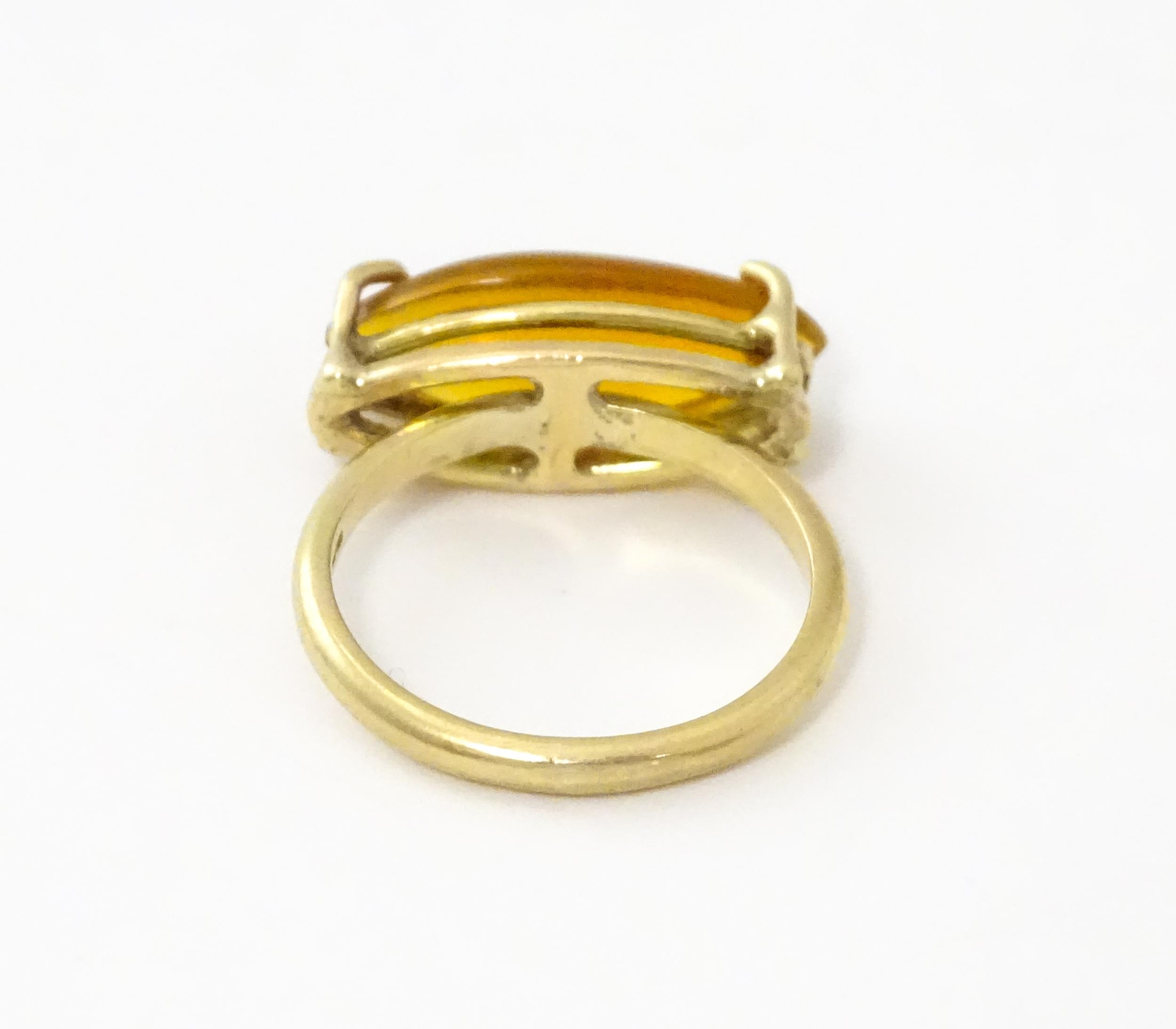 A 9ct gold ring with fire opal approx 3/4" long. Ring size approx. M Please Note - we do not make - Image 5 of 7