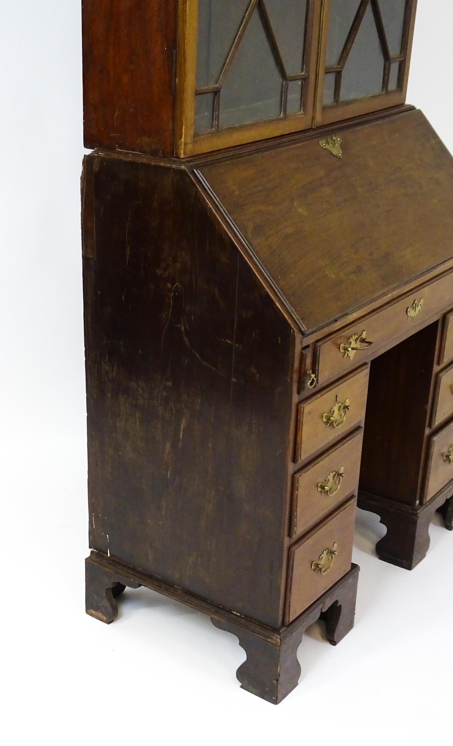 A Georgian mahogany bureau bookcase, with a moulded top above two astragal glazed doors and a fall - Image 4 of 11