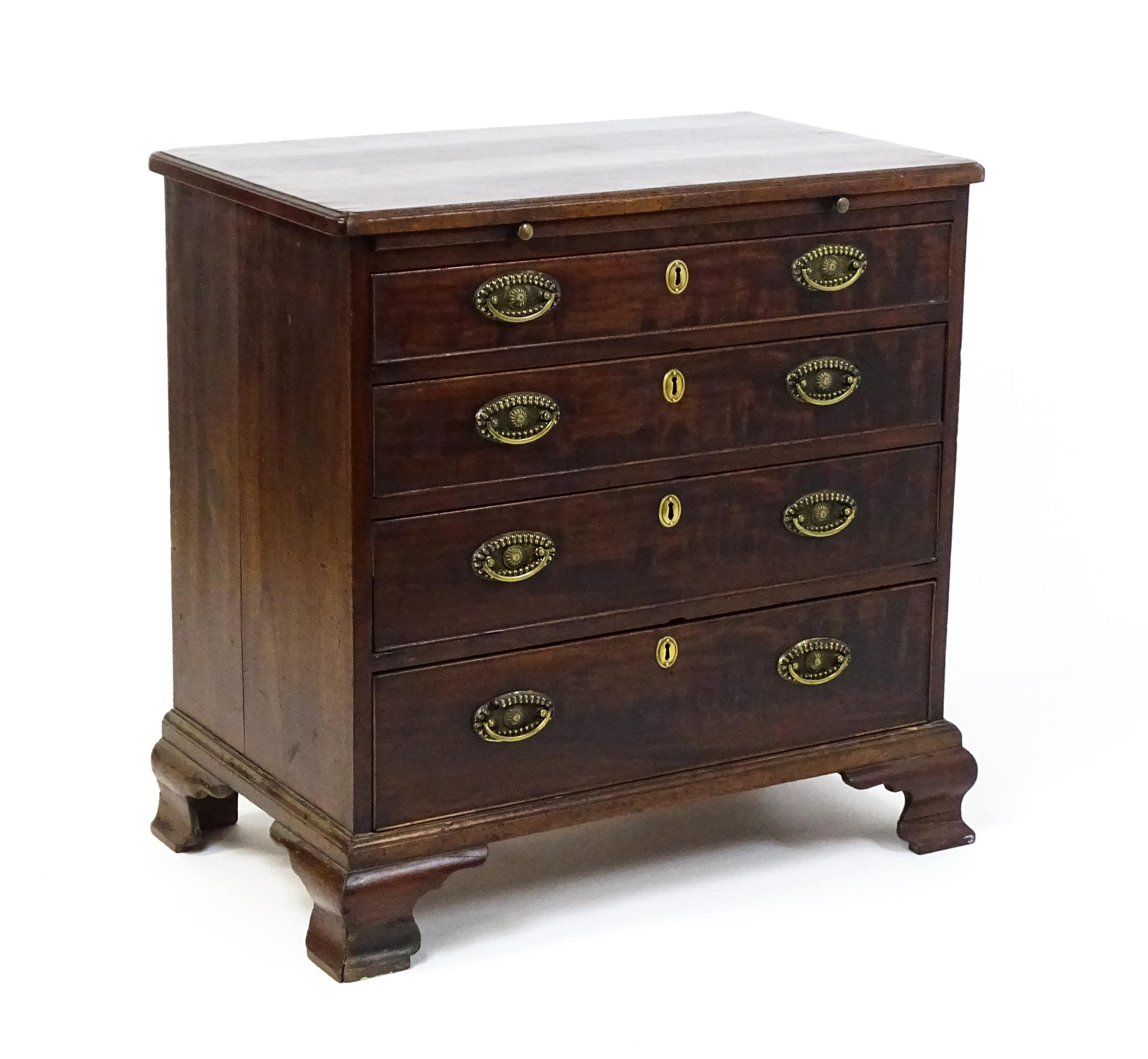 A George III mahogany bachelors chest of drawers, the moulded top having re-entrant corners above - Image 3 of 9