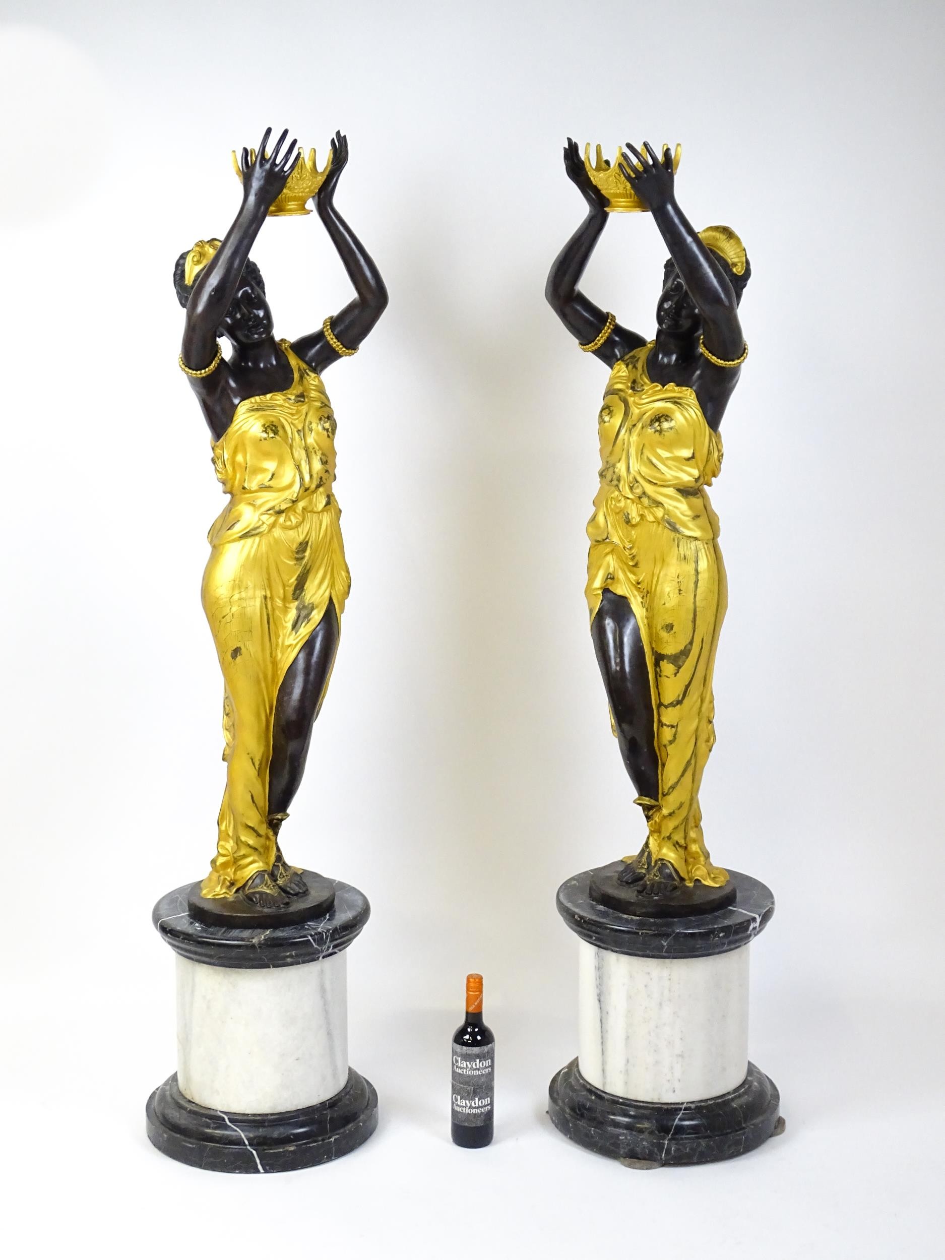 A pair of large cast bronze female blackamoor torcheres with gilt detail, raised on marble - Image 2 of 15