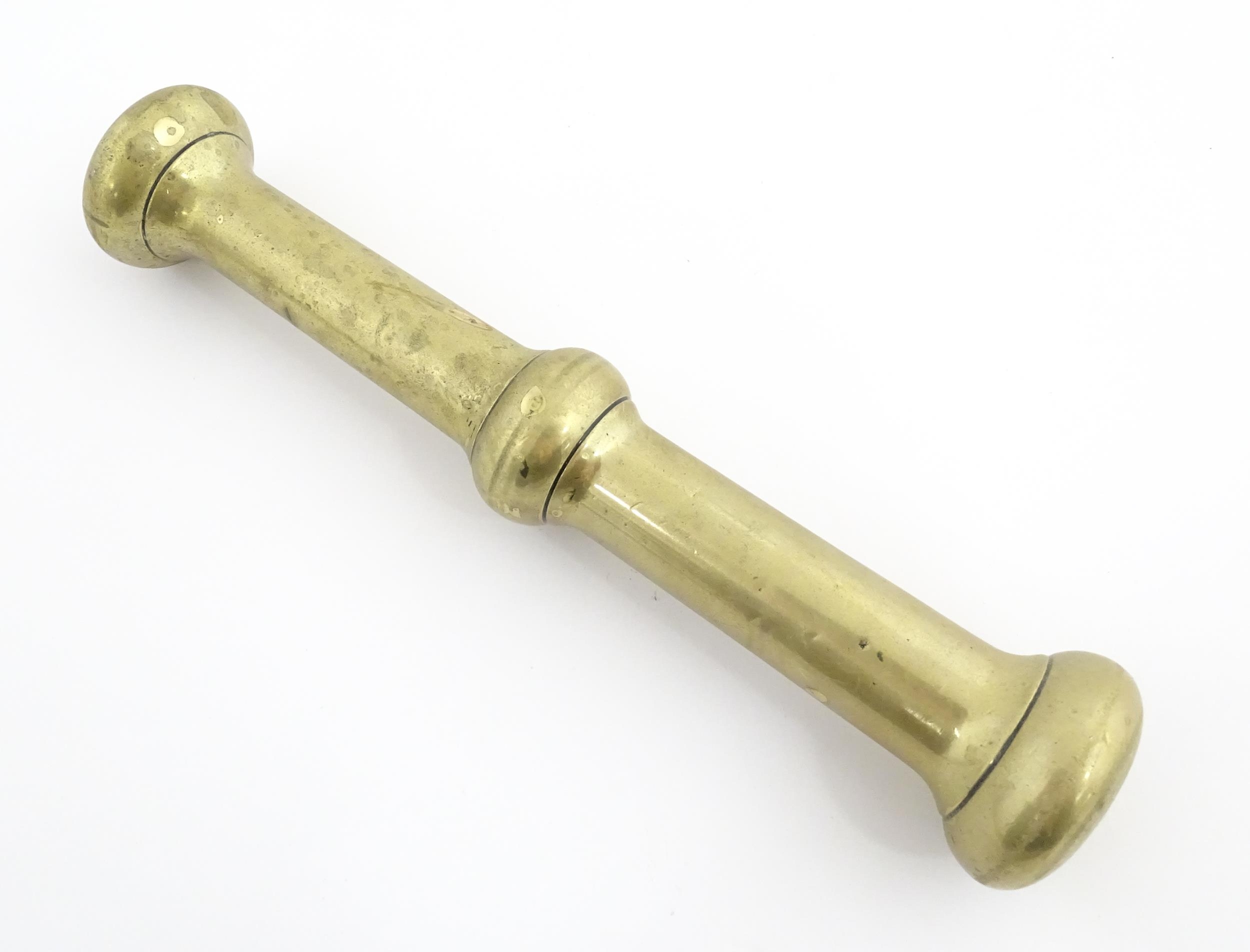 A 19thC brass pestle and mortar, the mortar of tapering form with twin rectangular handles. Mortar - Image 12 of 14