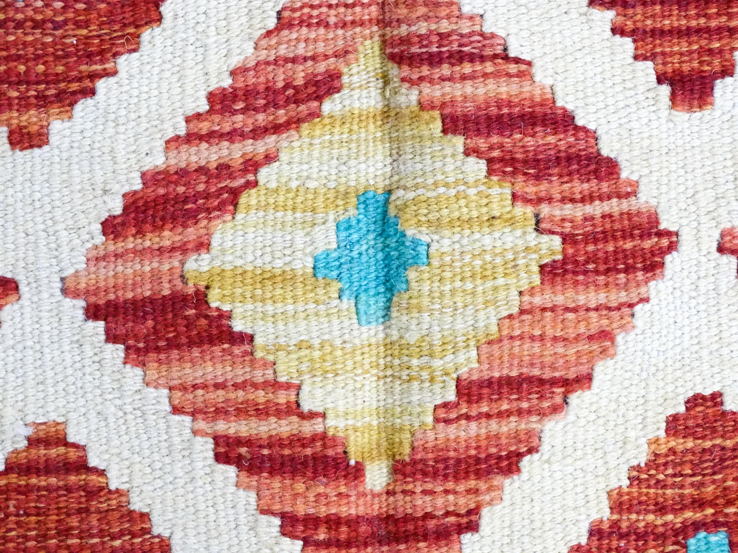 Carpet / Rug : A Turkish Anatolian kilim rug with repeating geometric motifs. Approx. 72" x 48" - Image 6 of 7