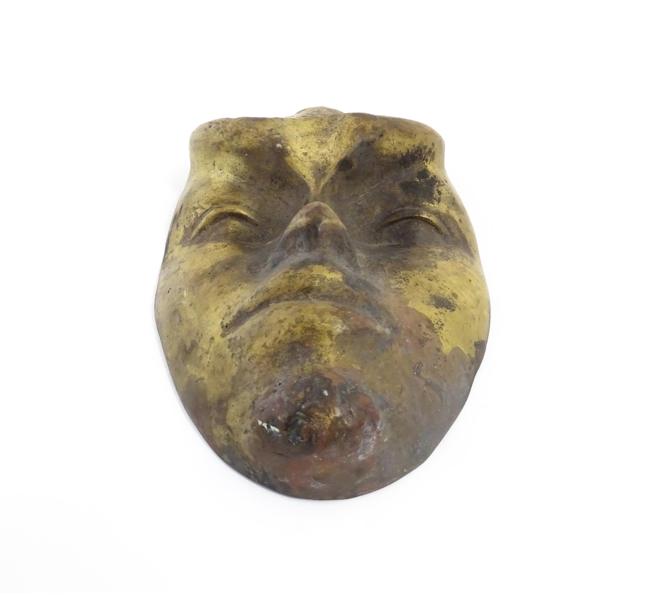 A 20thC bronze mask / plaque modelled as a face. Approx. 7 1/2" long Please Note - we do not make - Image 3 of 7