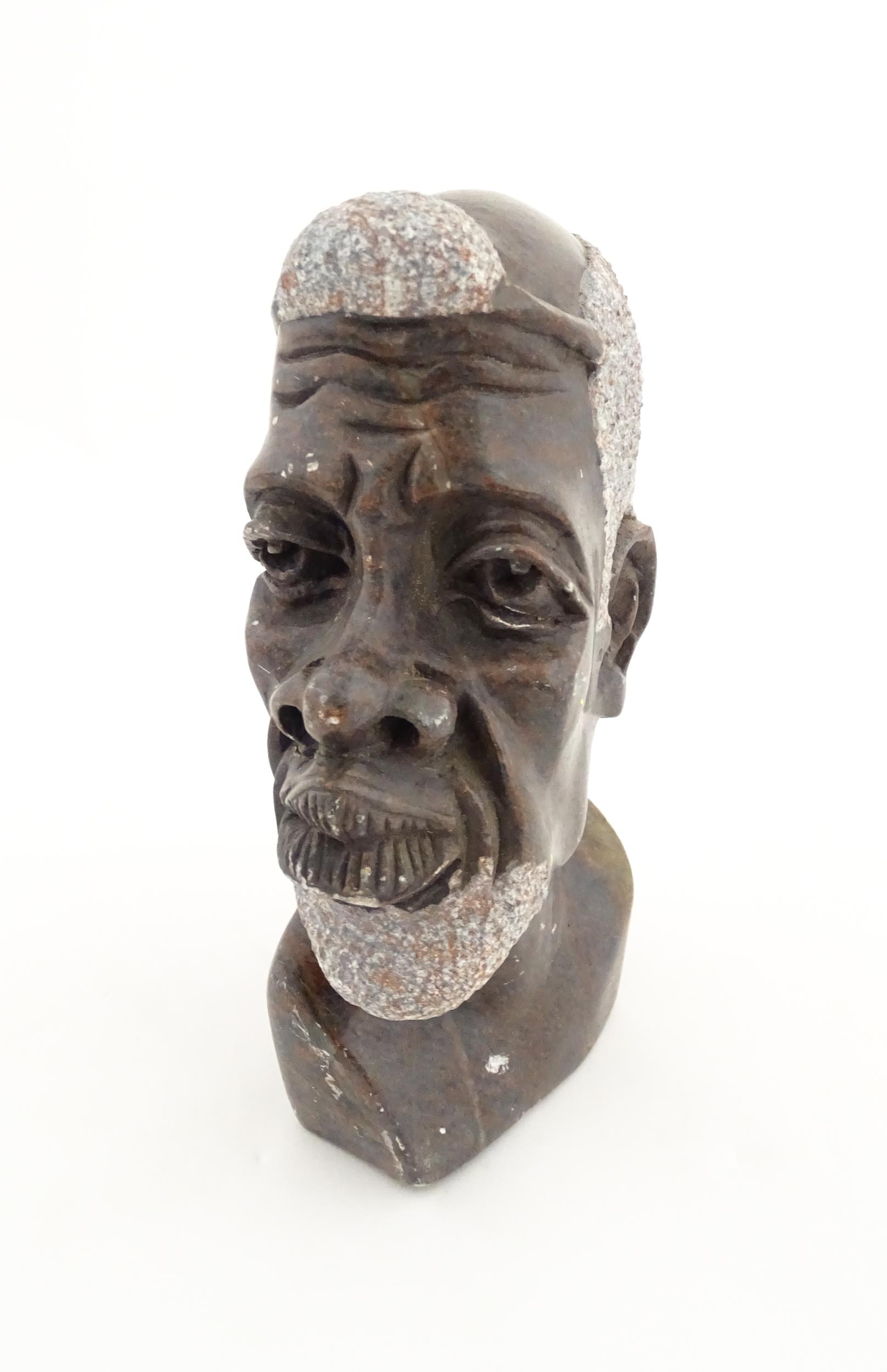 Ethnographic / Native / Tribal : An African carved soapstone bust modelled as the head of a - Image 2 of 7
