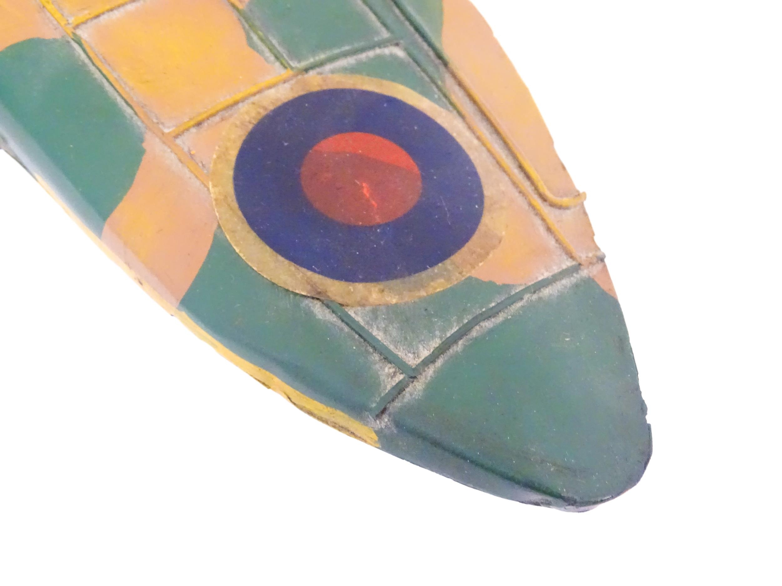 A 20thC scratch built tin plate scale model of a spitfire. Approx. 18" wide Please Note - we do - Image 7 of 10