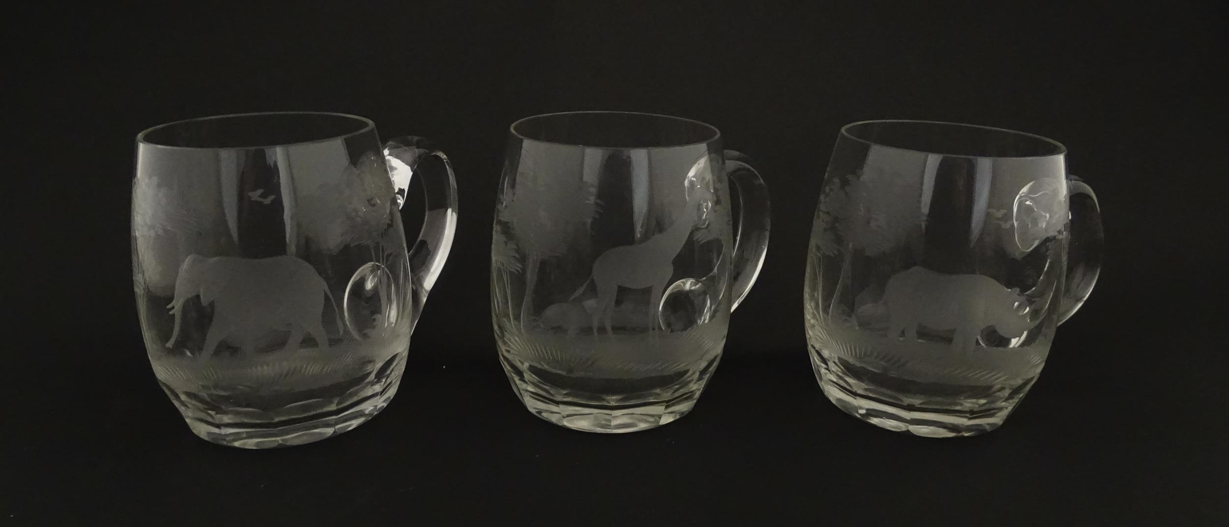 Seven Rowland Ward pint mugs / glasses with engraved Safari animal detail. Unsigned. Approx. 4 1/ - Image 18 of 26