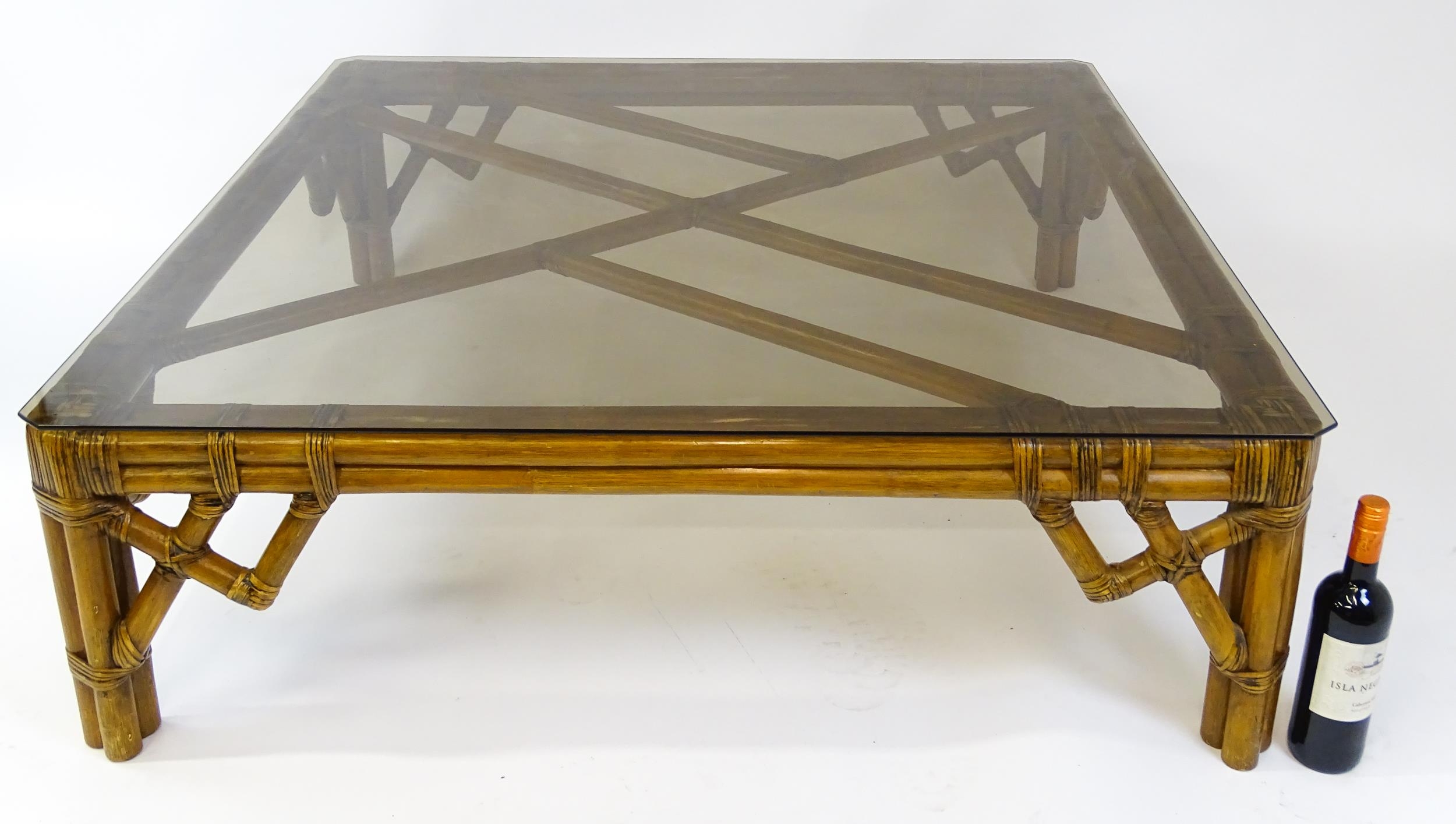 A late 20thC bamboo style glass topped coffee table. 48" wide x 48" deep x 15" high. Please Note - - Image 5 of 10