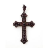 A Victorian pendant of crucifix form set with garnets. Approx 3" long Please Note - we do not make