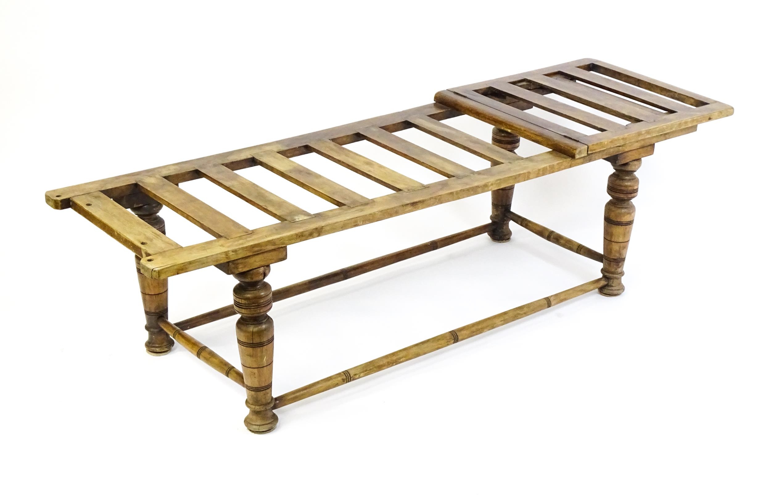 A late 19thC 'Leveson & Sons' campaign bed /day bed with a slatted bed and adjustable headrest above - Image 2 of 9