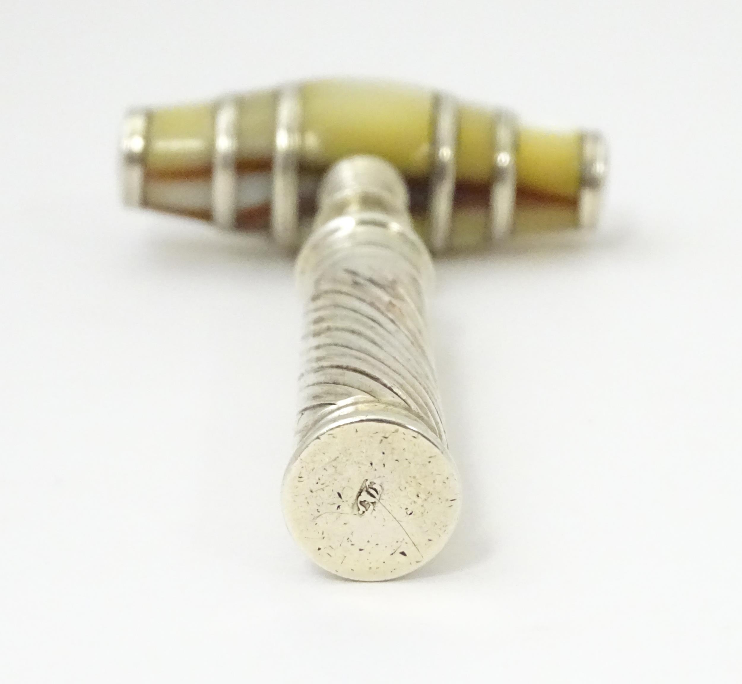 An 18thC silver pocket / travelling corkscrew with mother of pearl handle of barrel form, maker - Image 2 of 6