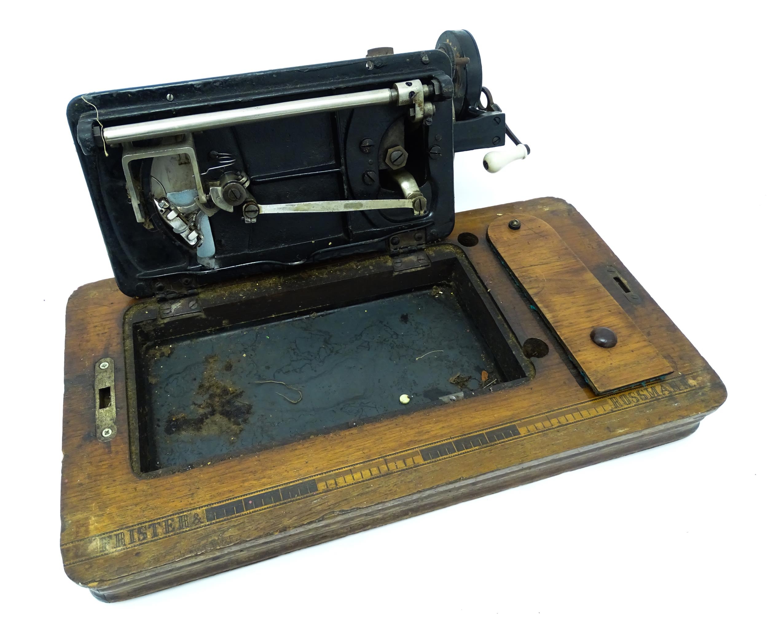 An early 20thC Frister & Rossmann hand crank sewing machine with floral and foliate decoration. - Image 13 of 15