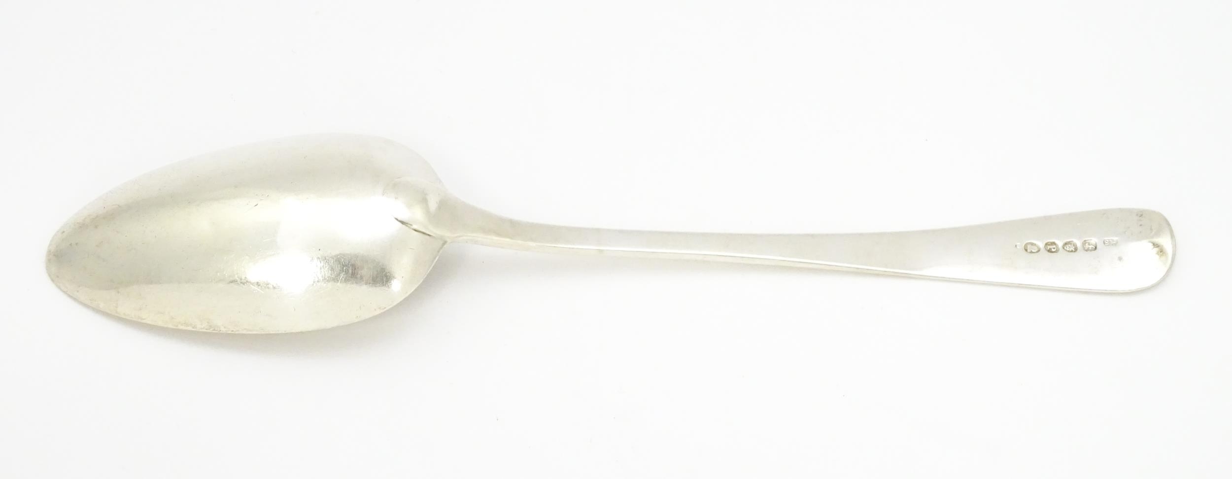 A Geo III silver table spoon hallmarked London 1810, maker Solomon Houghton. Approx. 9" long - Image 6 of 6