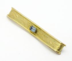 A brooch set with central blue stone, maker Andreas Daub and signed Amerikaner AB. Approx. 2 1/2"