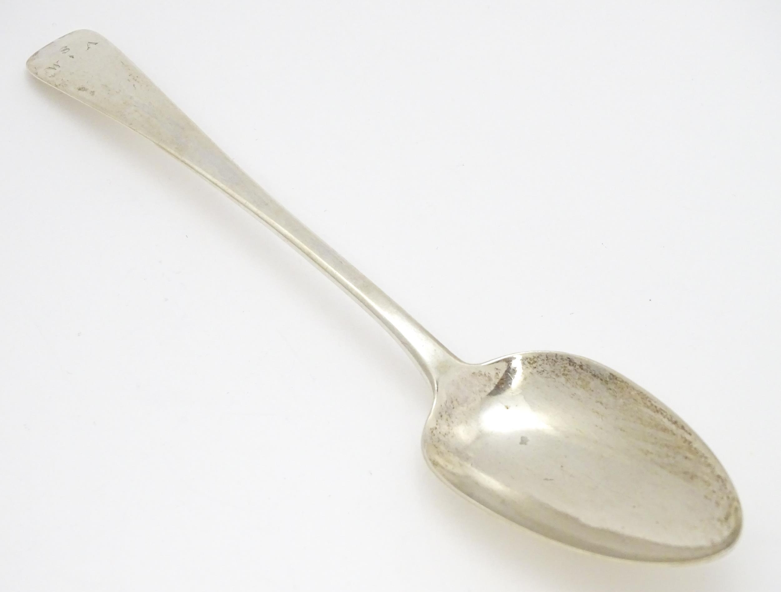 A Geo III silver table spoon hallmarked London 1810, maker Solomon Houghton. Approx. 9" long - Image 3 of 6