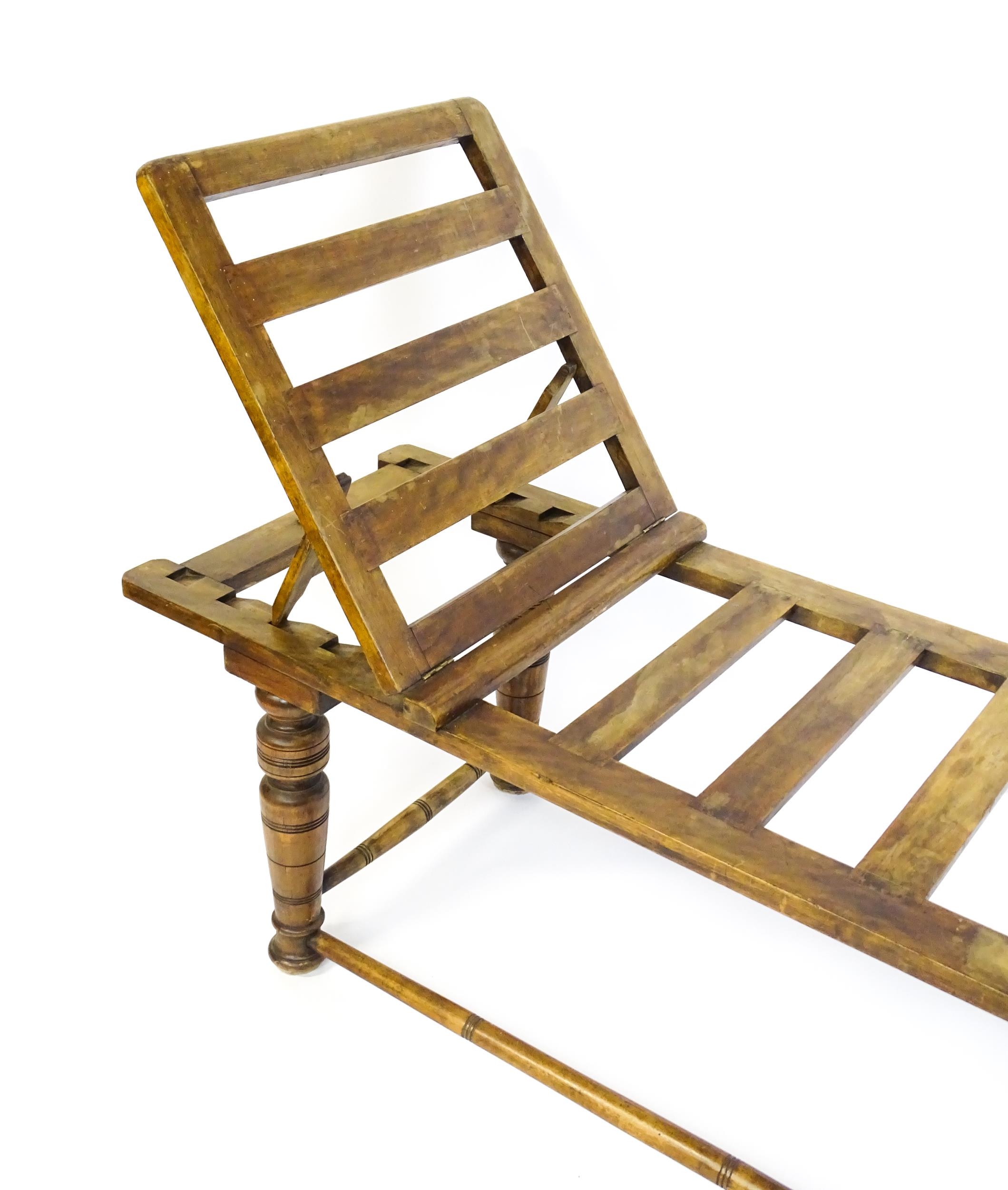 A late 19thC 'Leveson & Sons' campaign bed /day bed with a slatted bed and adjustable headrest above - Image 7 of 9