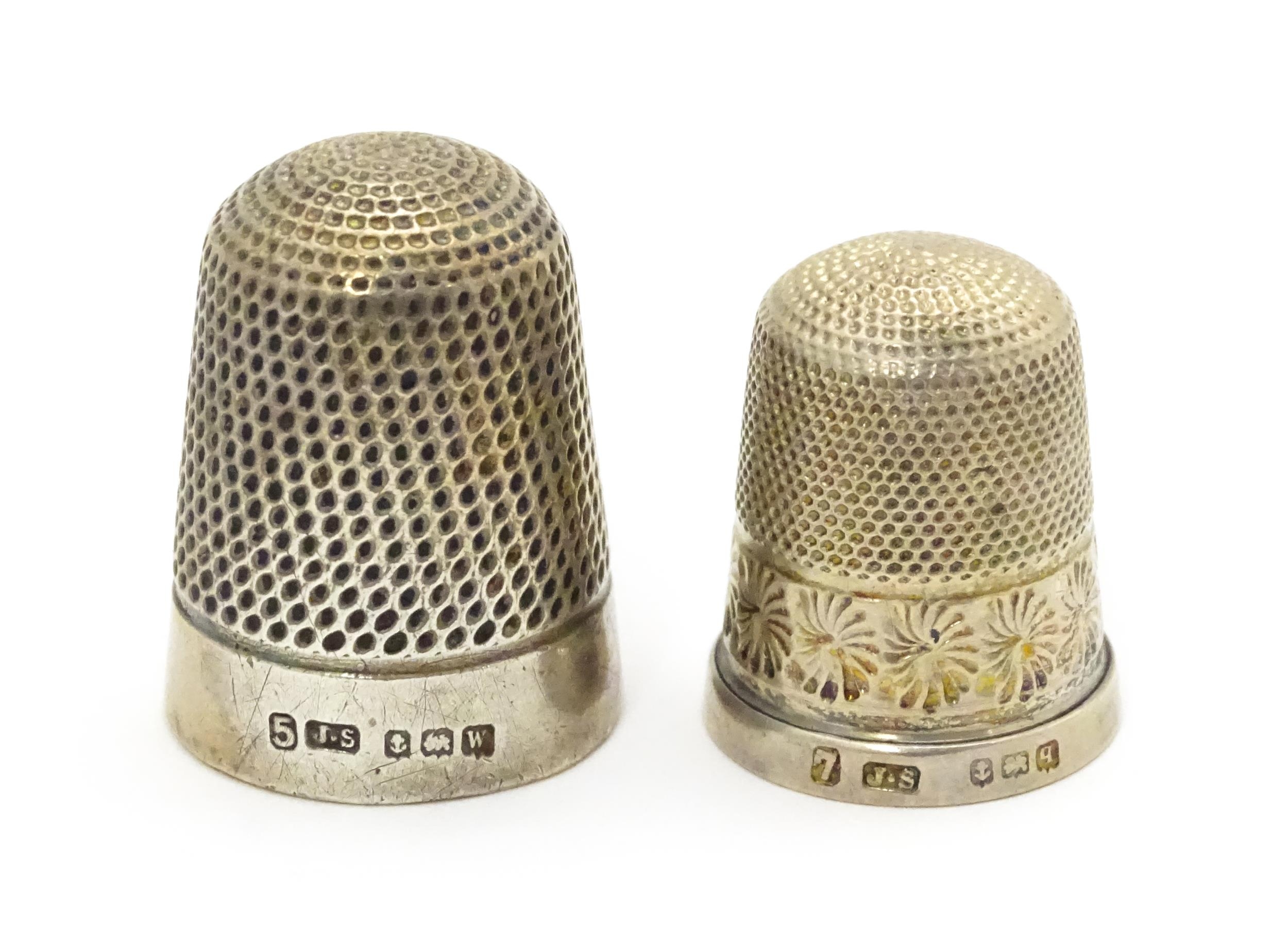 Two silver thimbles hallmarked Birmingham 1915 / 1921, maker James Swann (2) Please Note - we do not - Image 4 of 5