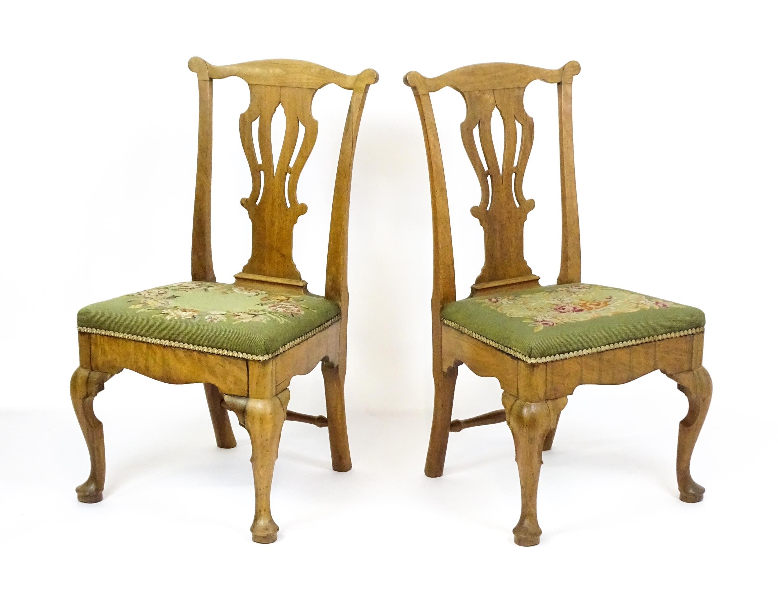 A pair of George II walnut side chairs with shaped top rails above pierced splats and raised on - Image 7 of 7