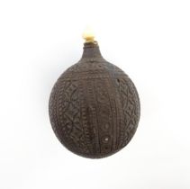 A late 19th / early 20thC carved coconut snuff bottle / flask with banded floral and foliate detail.