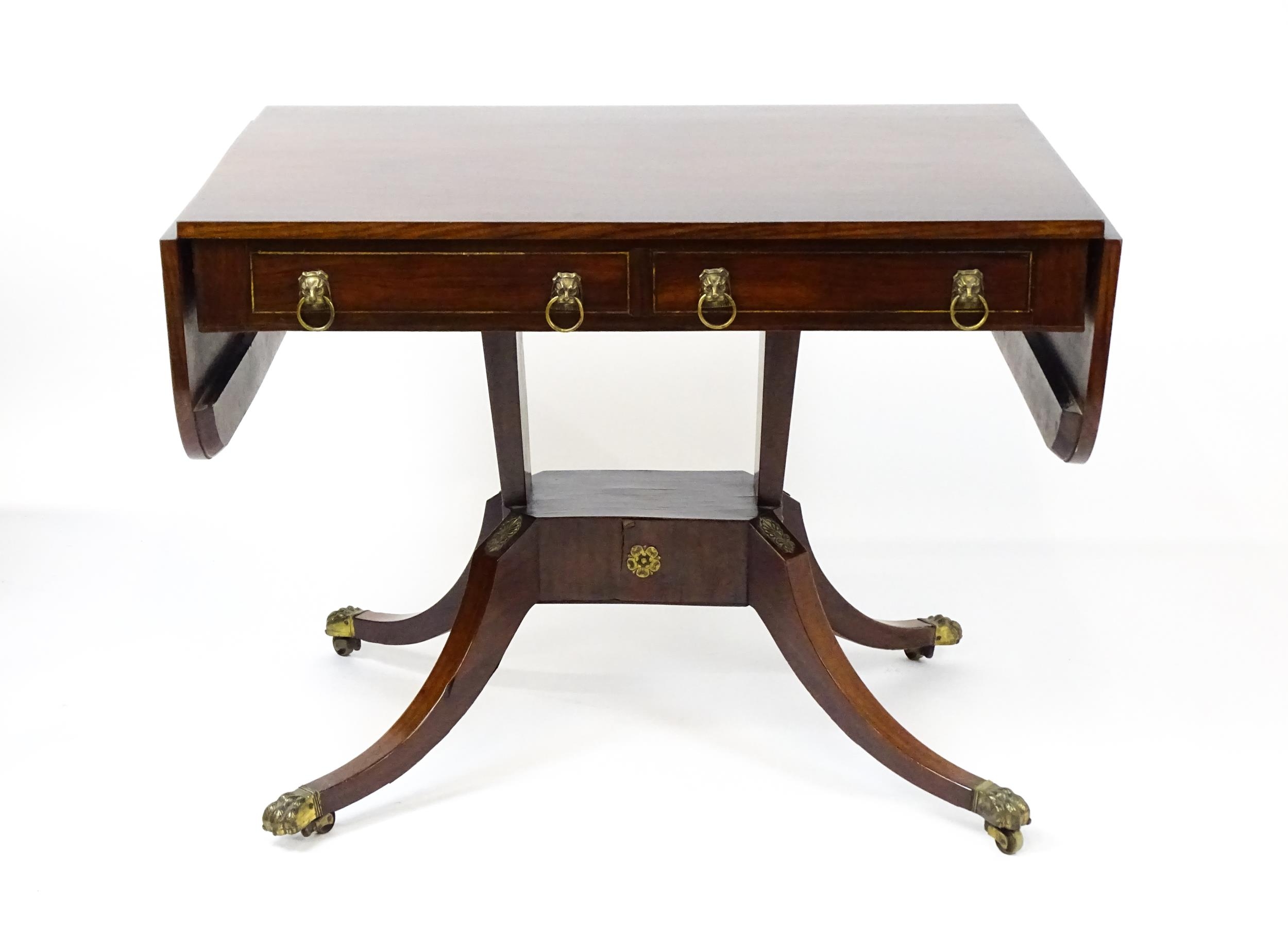 A 19thC and later sofa table with drop flaps to either side, two small frieze drawers opposing two - Image 2 of 10