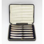 A cased set of silver handled tea knives, hallmarked Sheffield 1921, maker Harrison Fisher & Co.