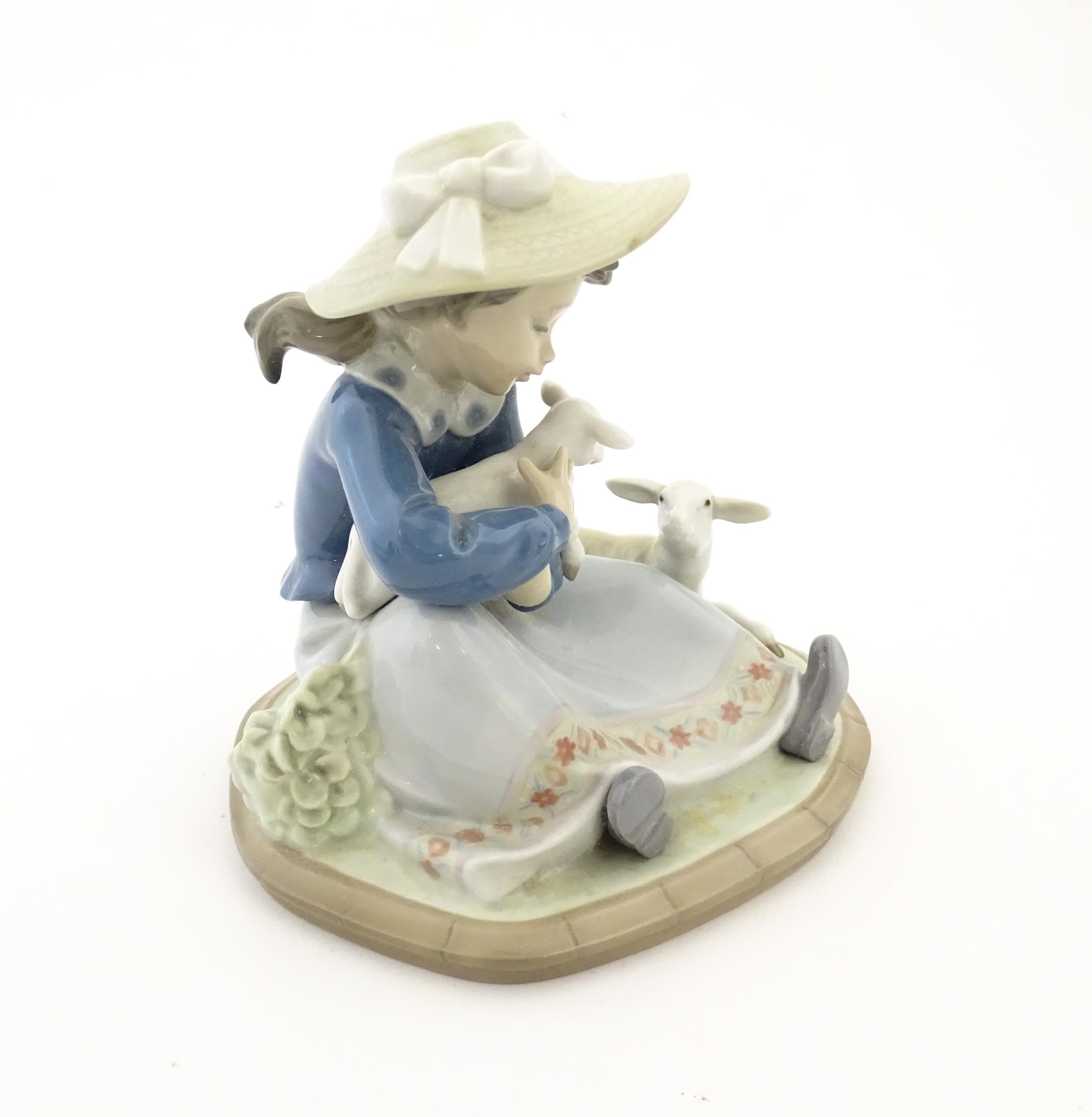 A Lladro model Lambkins, model no. 5469. Marked under. With box. Approx. 5 3/4" high Please Note - - Image 4 of 8