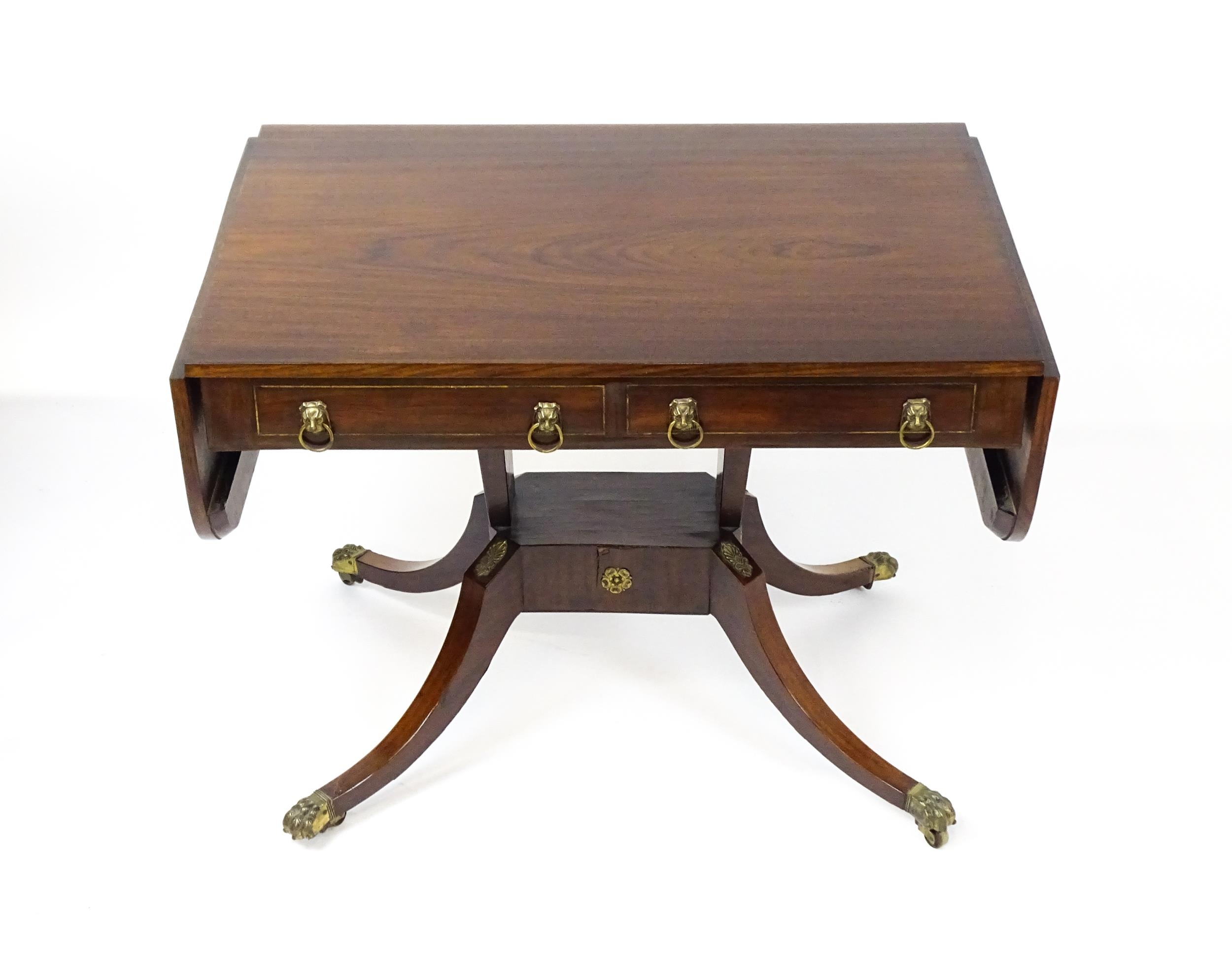 A 19thC and later sofa table with drop flaps to either side, two small frieze drawers opposing two - Image 10 of 10