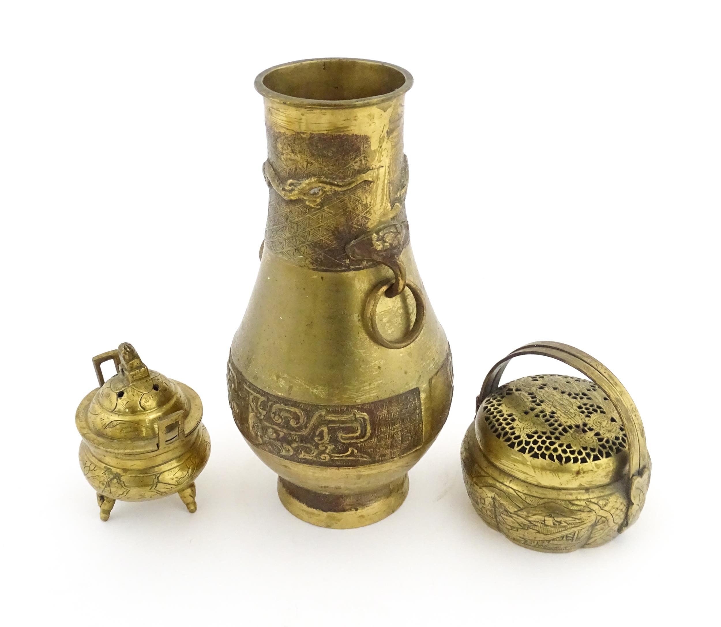 Three items of Chinese brass ware to include a baluster vase with twin ring handles decorated with - Image 3 of 9