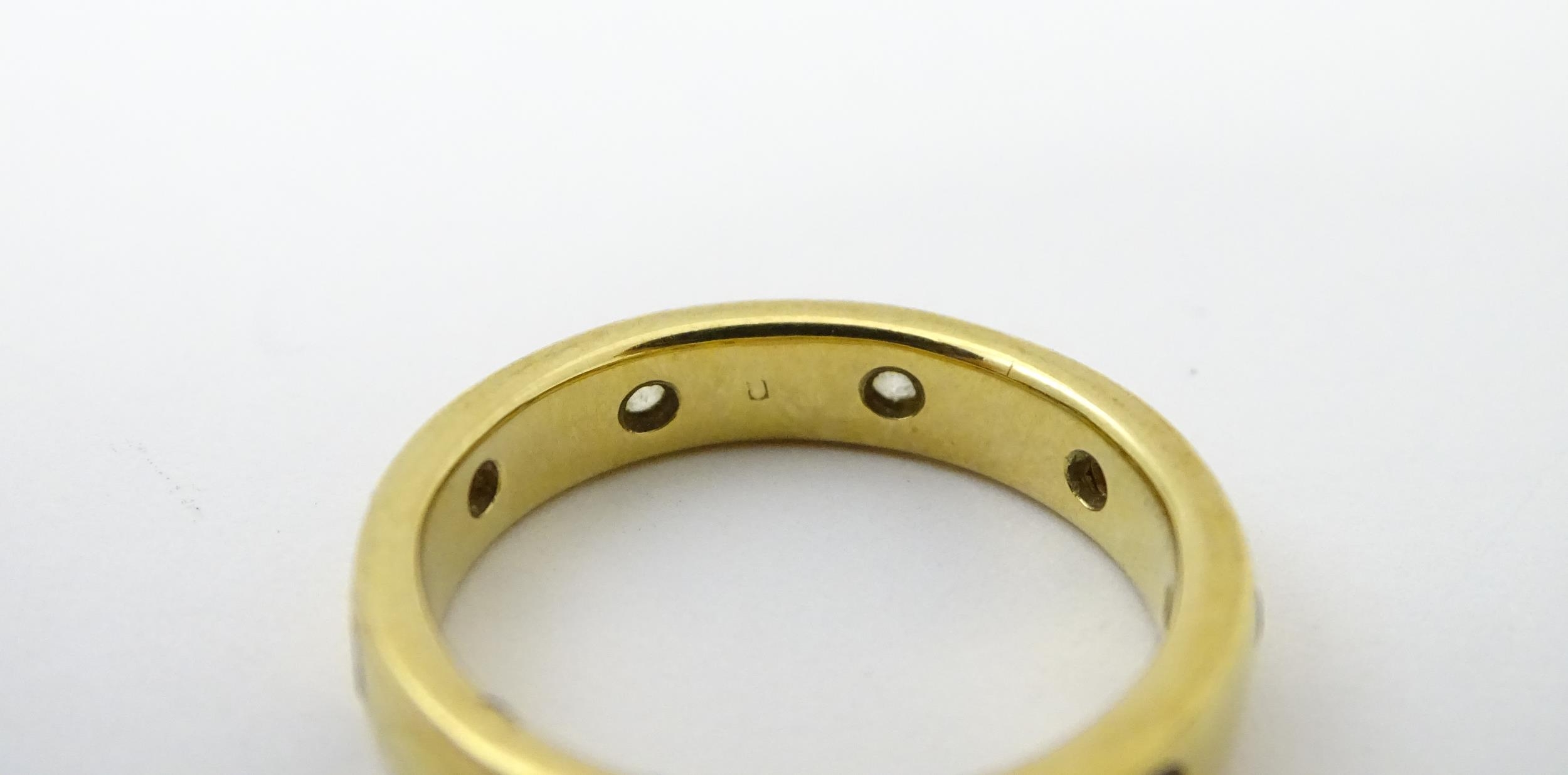 A yellow metal eternity ring set with white stones. Ring size approx. Q 1/2 Please Note - we do - Image 6 of 6