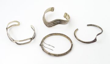 Four assorted silver bracelets / bangles, to include one with bamboo detail hallmarked Birmingham