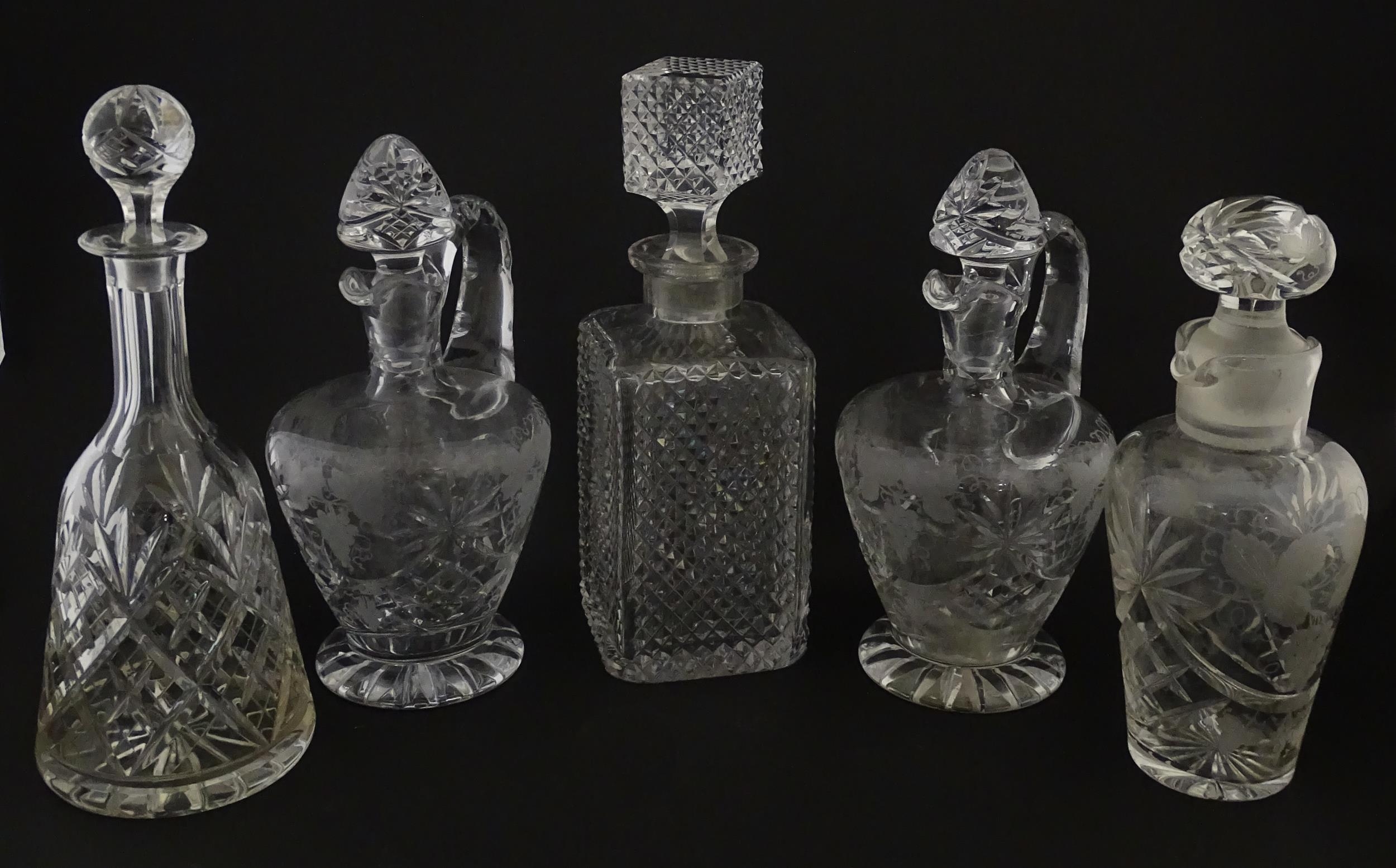 A quantity of assorted cut glass decanters, claret jugs, etc. Largest approx. 11 1/4" high (5) - Image 6 of 10