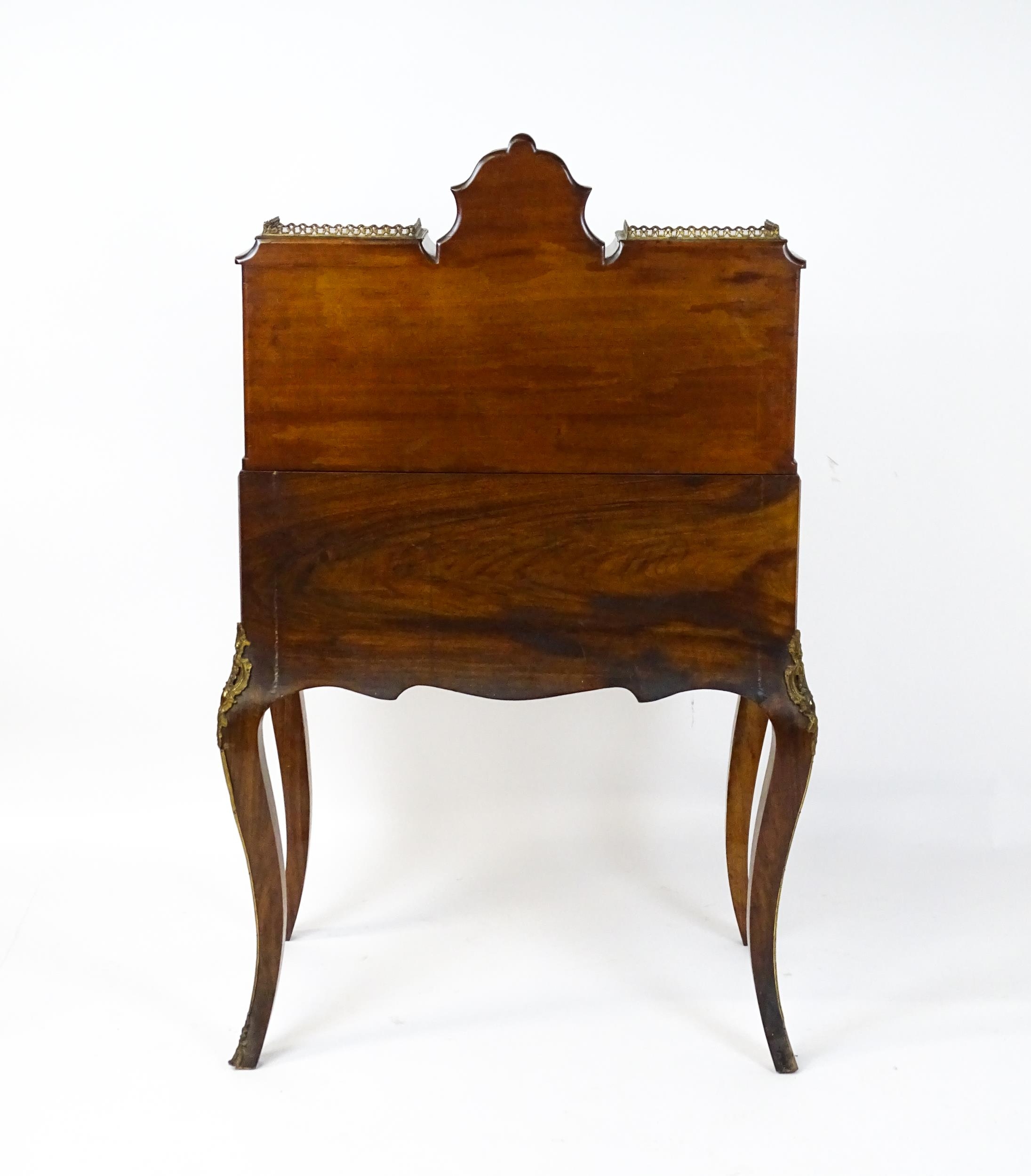 A 19thC burr walnut Bonheur du jour with a mirrored back stand and flanked by two glazed cabinets - Image 2 of 11