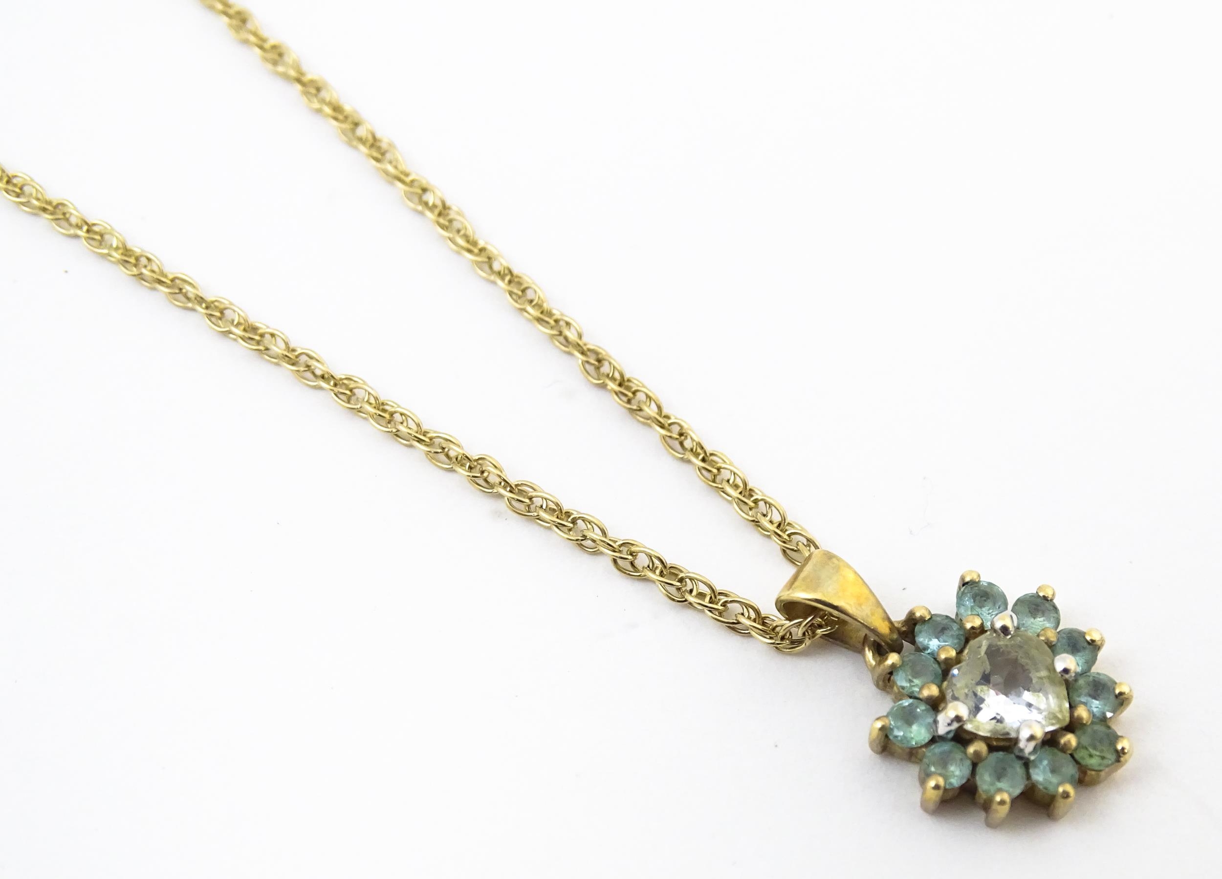 9ct gold pendant set with white and aqua coloured stones, with chain necklace. The chain approx - Image 6 of 10