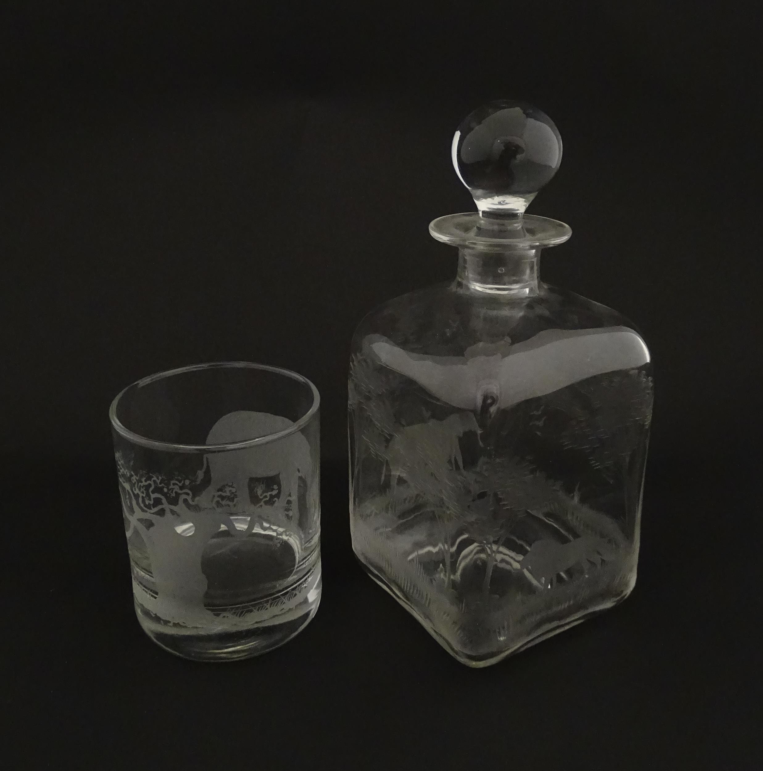 A Rowland Ward decanter glass with engraved Safari animal detail. Unsigned. Together with a similar - Image 7 of 11