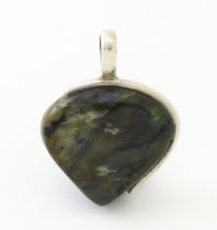 A labradorite pendant with hallmarked silver mount. Approx. 2" long Please Note - we do not make