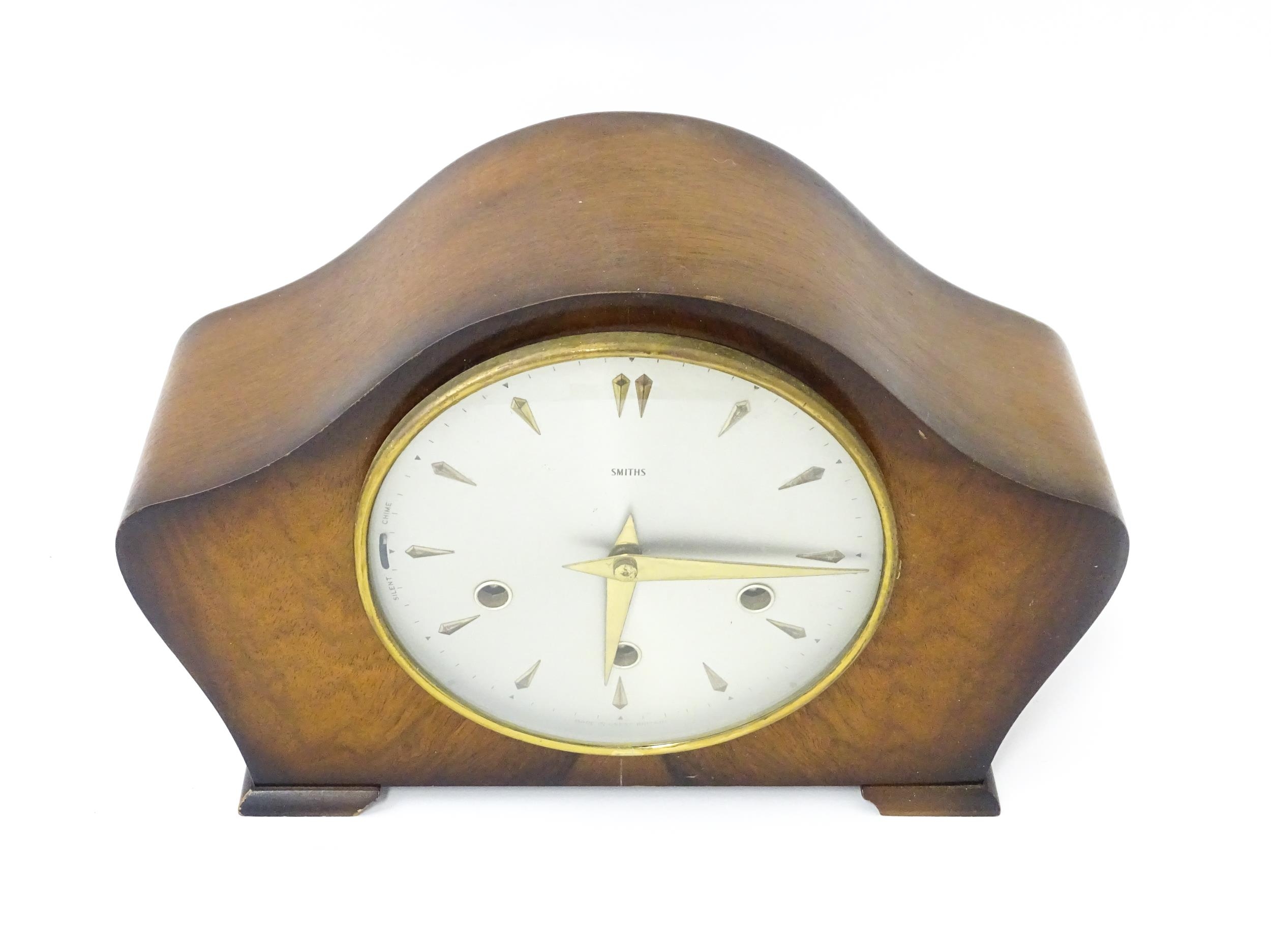 A 20thC smiths walnut cased mantle clock with chiming movement. Approx. 8" high Please Note - we - Image 5 of 9