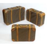 Louis Vuitton Luggage : Three graduated Louis Vuitton monogram suitcases with double strap detail.