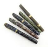 Five assorted fountain pens, comprising a c1920s Waterman '54' with chased hard rubber barrel &