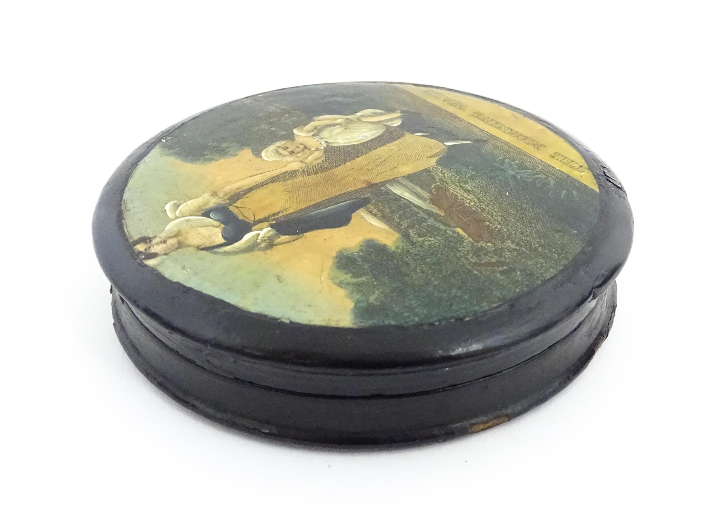 A 19thC papier mache lacquered snuff box of circular form, the lid with applied engraving titled The - Image 6 of 10