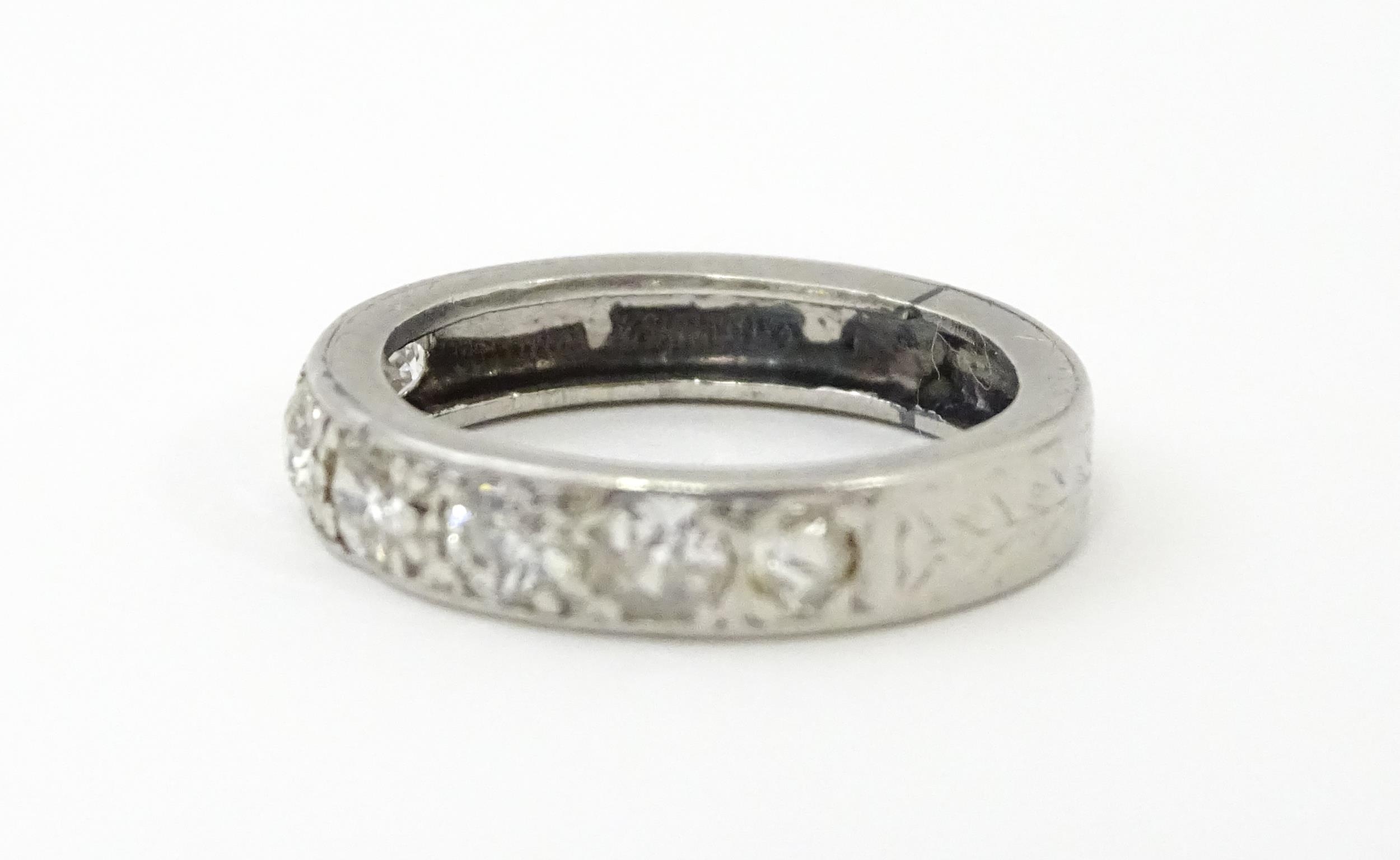 A diamond half eternity ring set with 7 diamonds. Ring size approx. L Please Note - we do not make - Image 2 of 9