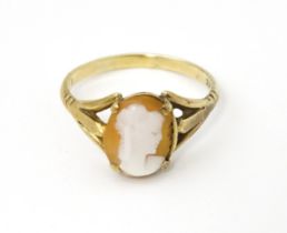 A 9ct gold ring set with classical cameo . Ring size approx. T Please Note - we do not make