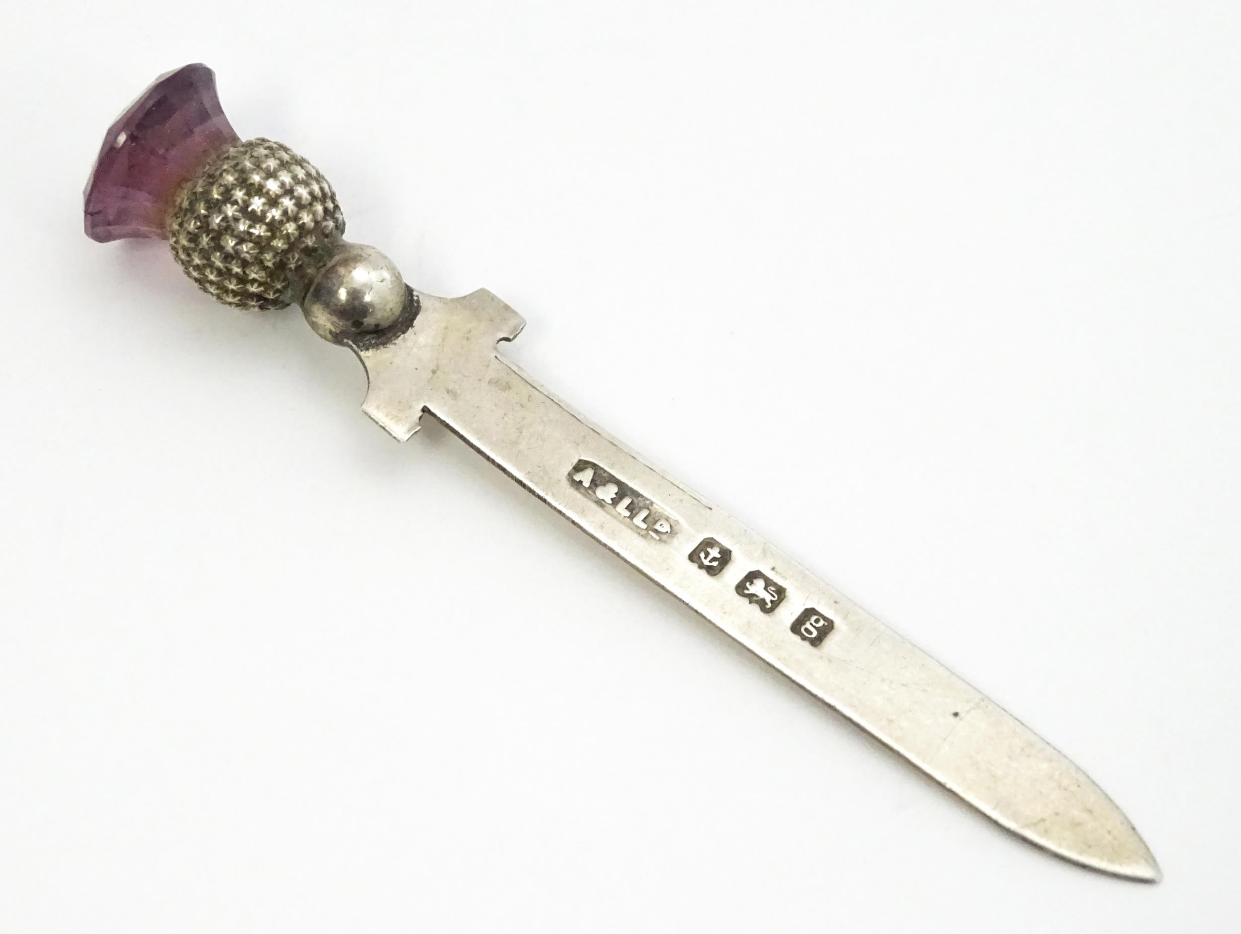 Three silver items comprising a small paper knife / bookmark with thistle finial hallmarked - Image 6 of 8