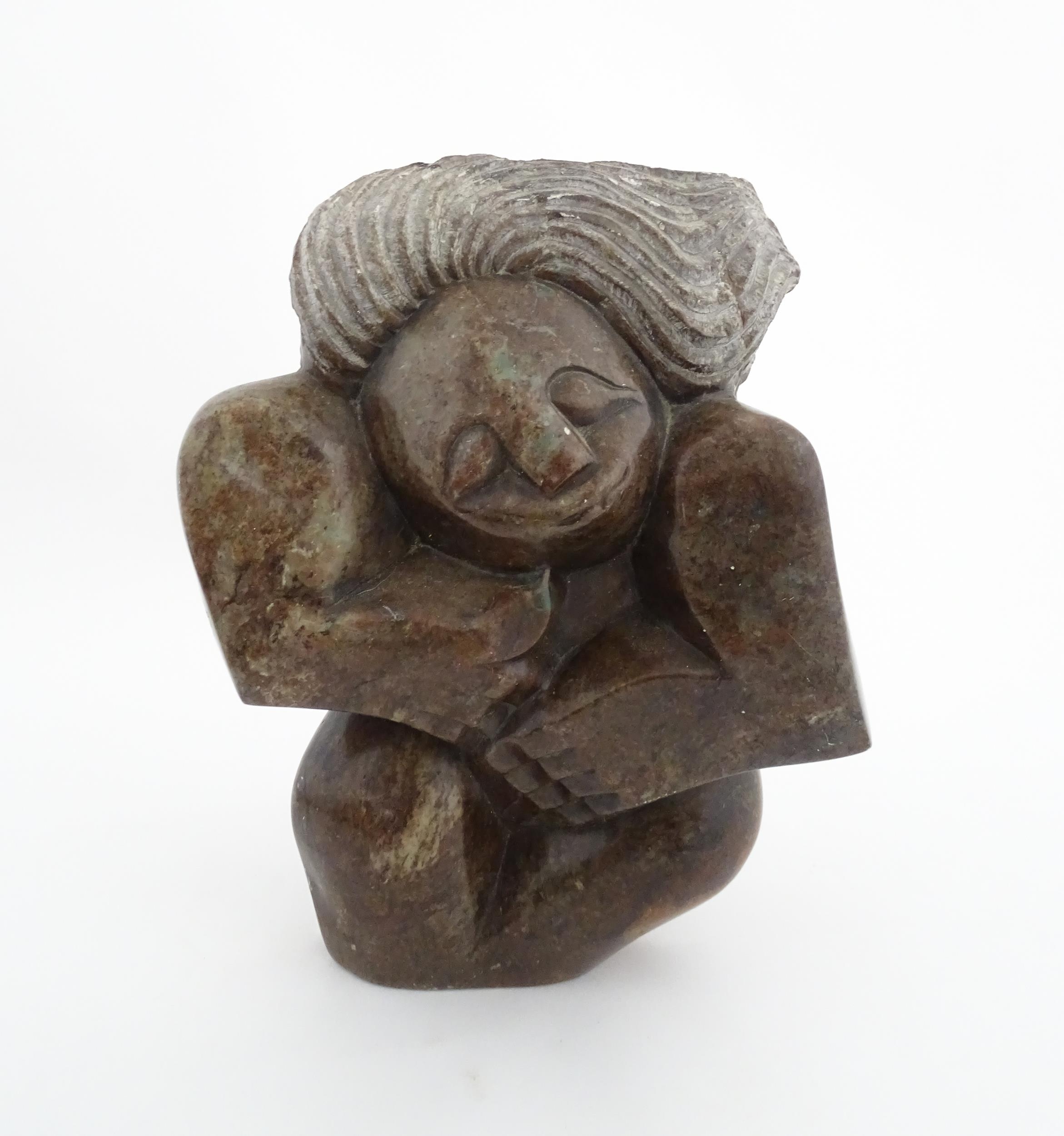 Ethnographic / Native / Tribal : An African carved soapstone sculpture depicting a stylised female